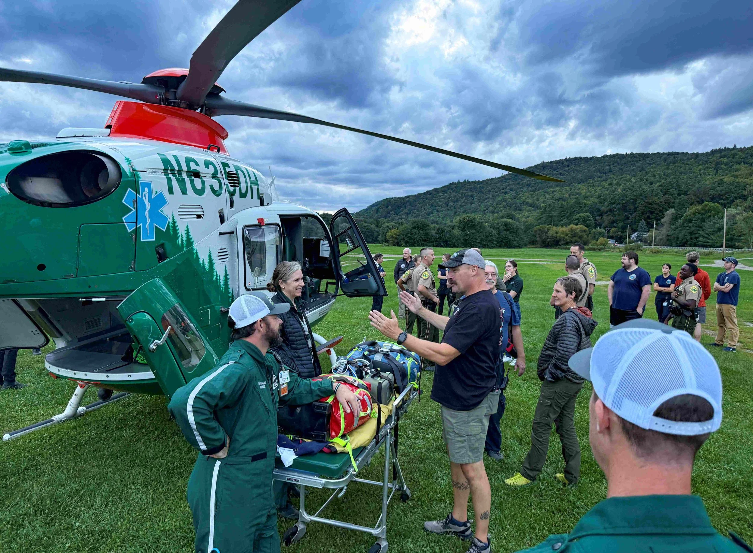   Waterbury Fire Department members, including Chief Gary Dillon (center), take part in the exercise. Photo by Gordon Miller  
