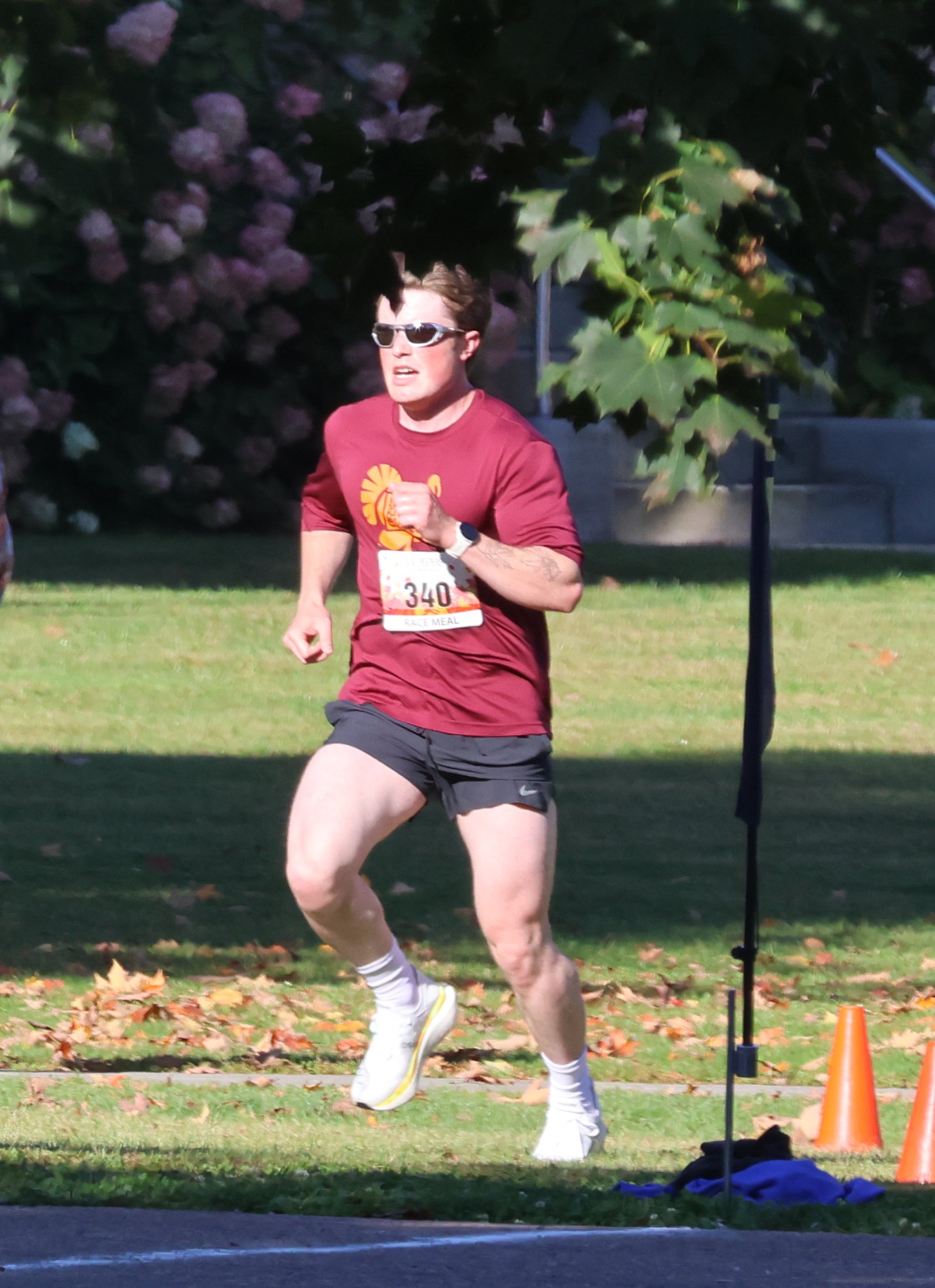   Ethan Boutin, 24, of Boston, finished second in the 5K in 19:28.5. Photo by Gordon Miller  