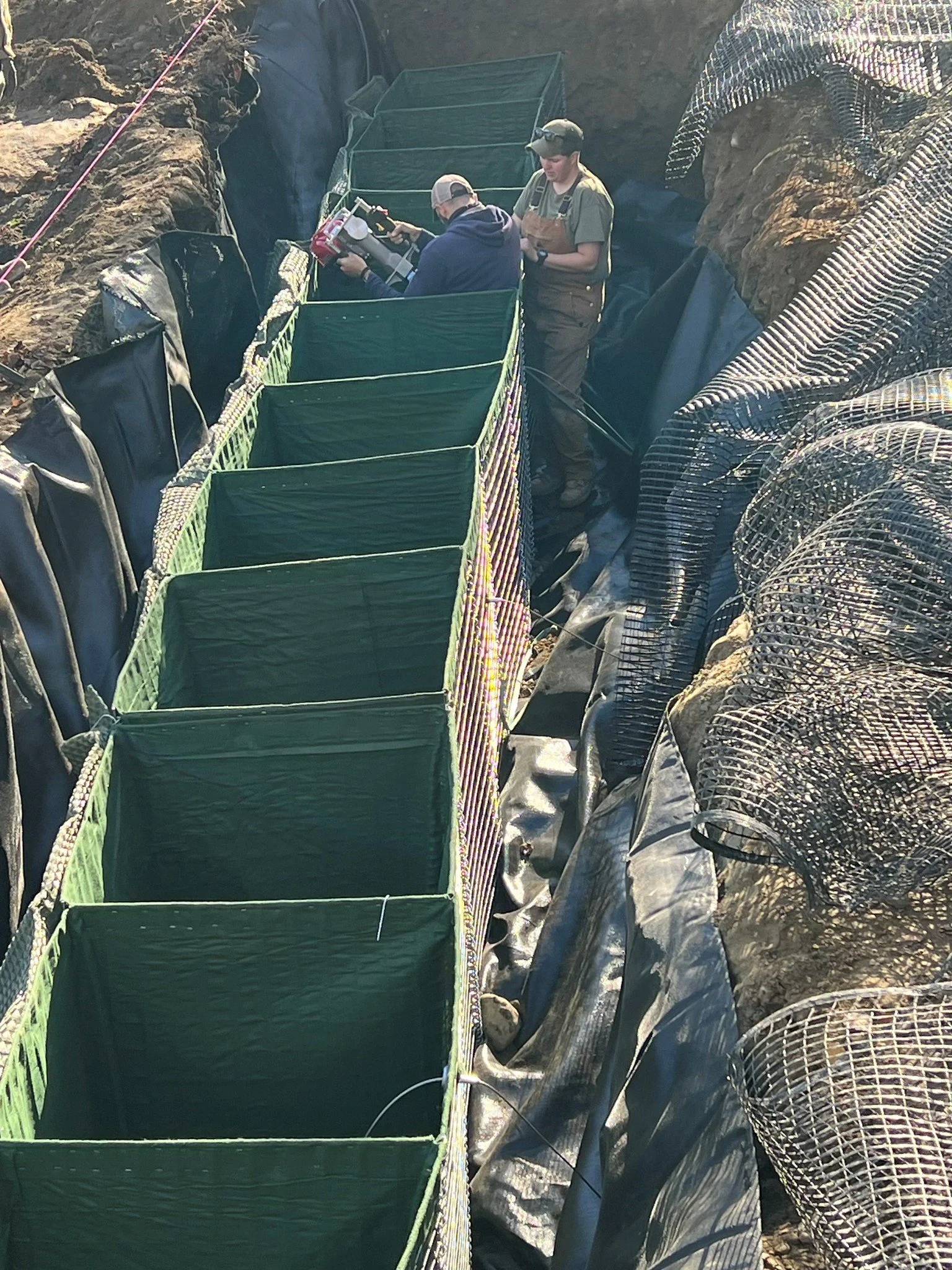   A specialized streambank erosion-control system is being installed along the Duxbury Road riverbank in Bolton. Photo courtesy of the Town of Bolton  