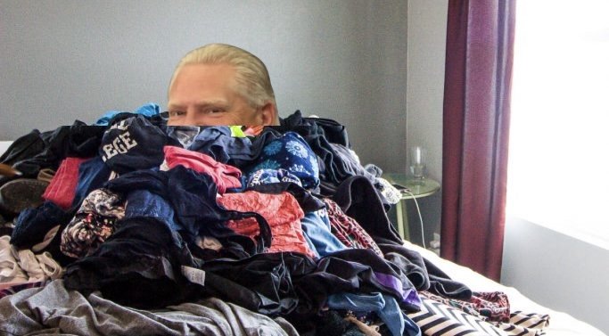 Doug Ford’s Current Legal Strategy To Hide Under A Big Pile Of Coats, Hoping The Whole Thing Will Just Go Away