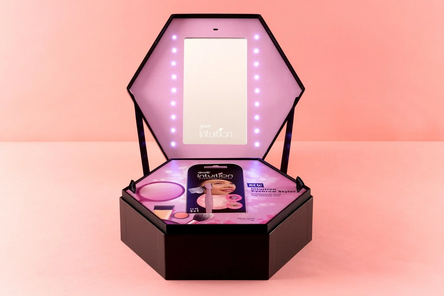 Brows, but make it an experience. ✨🪞

For Intuition by Wilkinson Sword, we created hexagon-shaped presentation boxes that bring a little extra drama to everyday beauty. Because precision tools deserve a proper reveal.

The hinged-lid hex box opens t