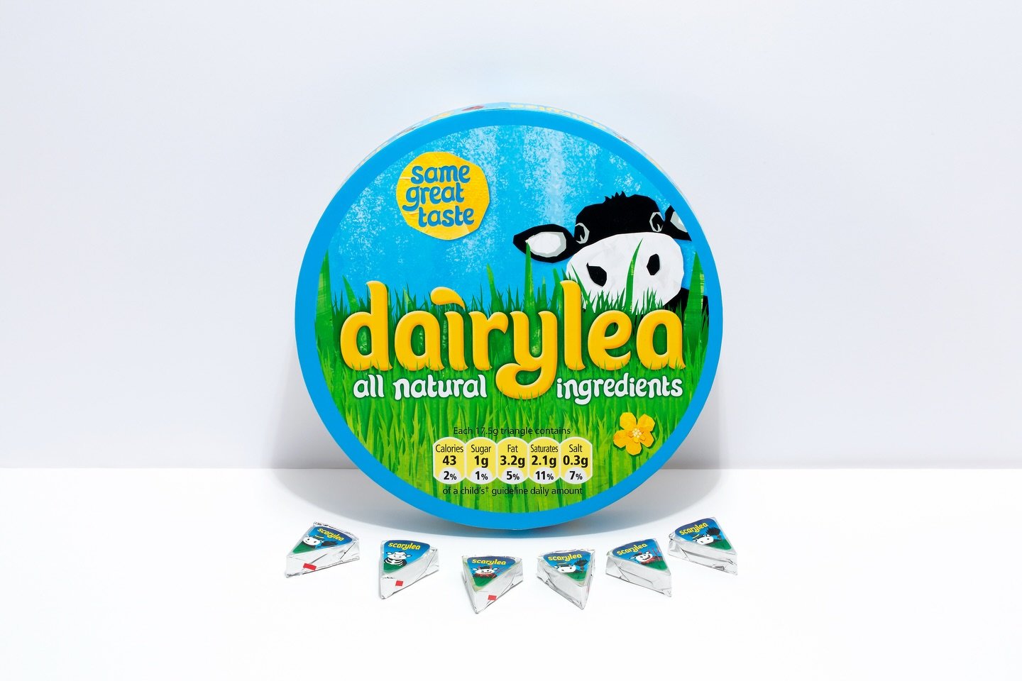 Same shape. New story. 🧀💚

For Dairylea, we created oversized round boxes that lean into the iconic form &mdash; but with a fresh focus on all-natural ingredients. Familiar, but upgraded.

The round shoulder box mirrors the classic look, opening to