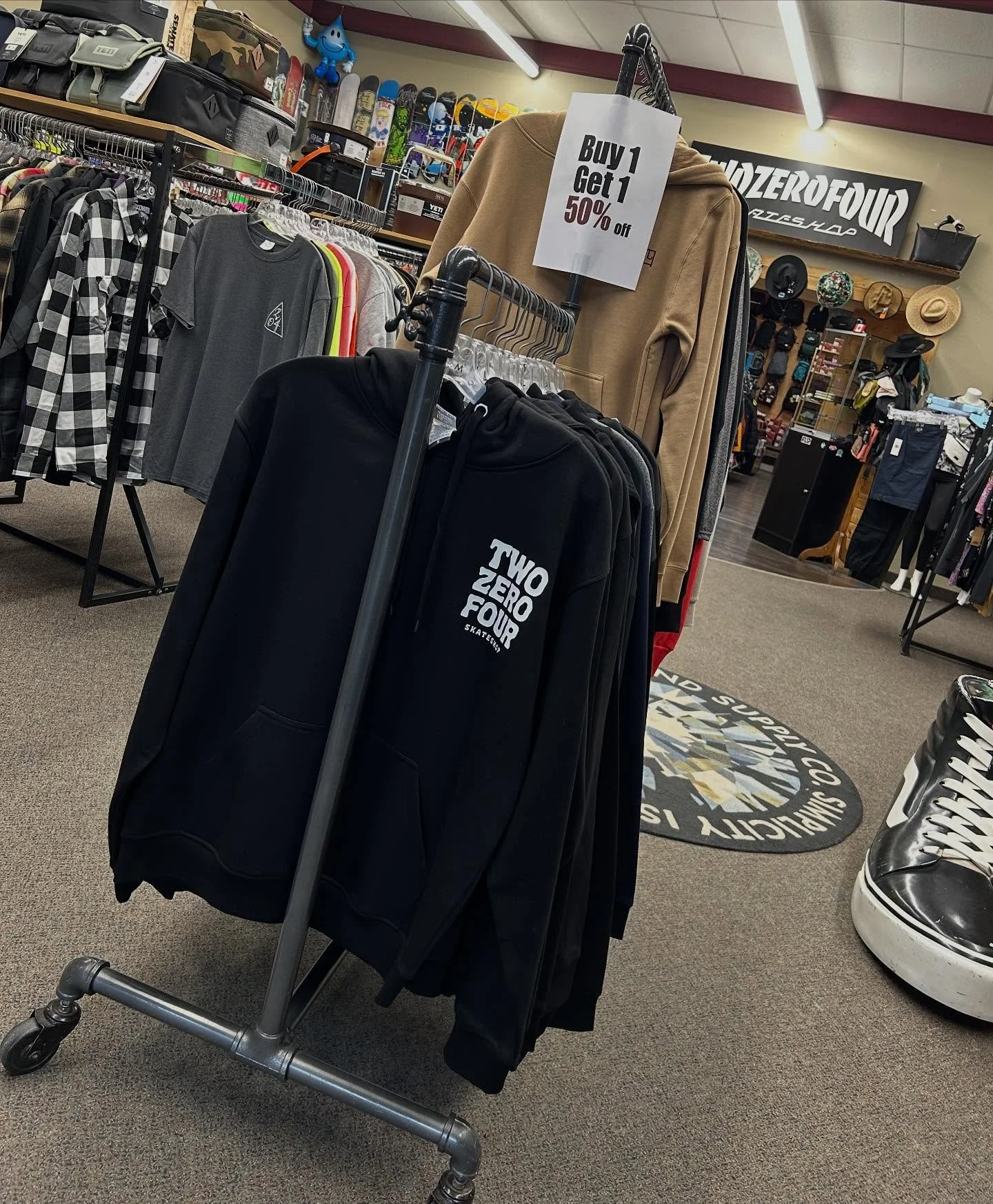 Everyone loves a good deal! Buy 1 get 1 50% off this whole sweater rack!!