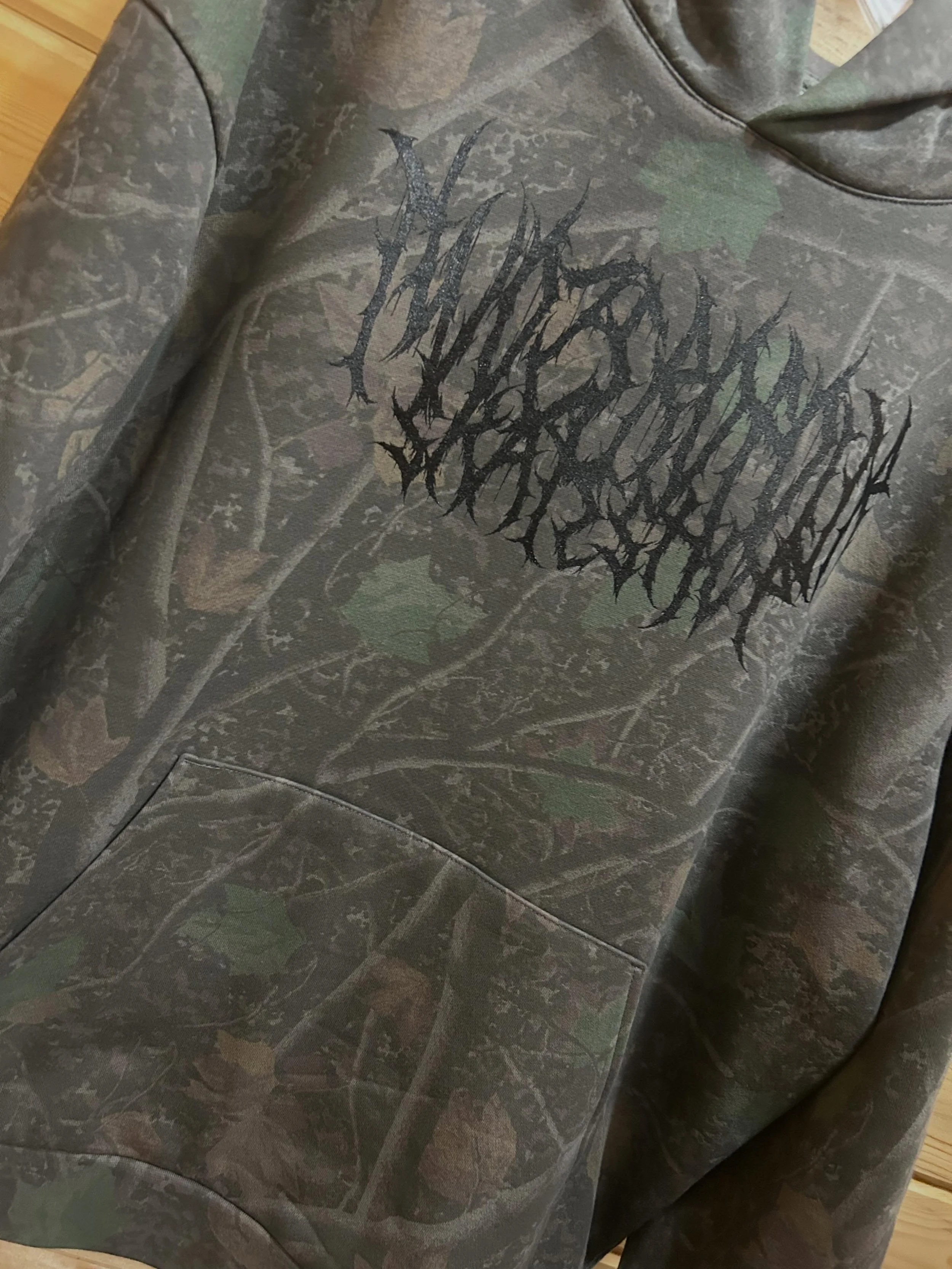 Cause who doesn&rsquo;t want a little Darkwood Camo mixed with our metal logo?