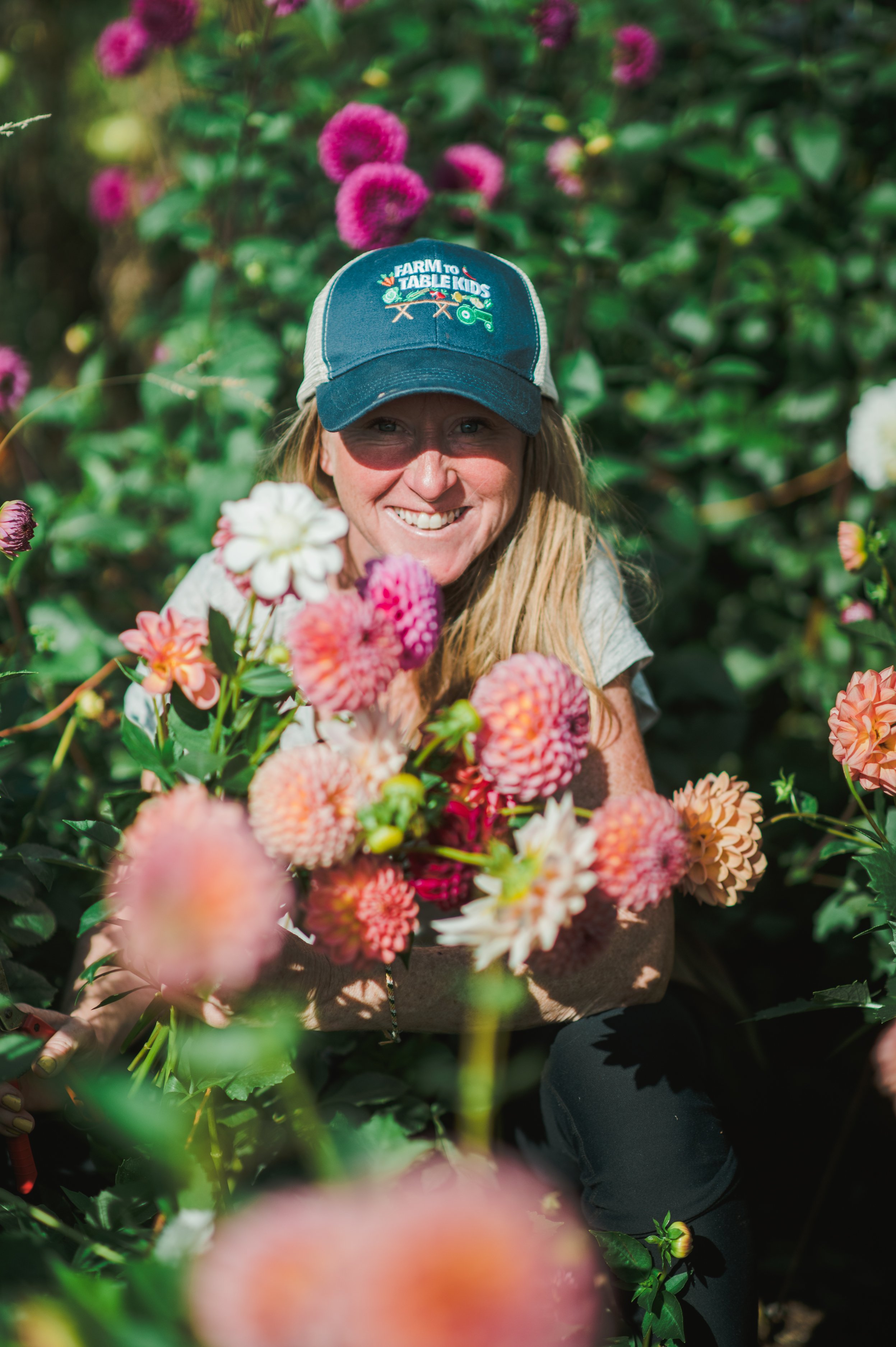 Steph with dahlias happy.jpg