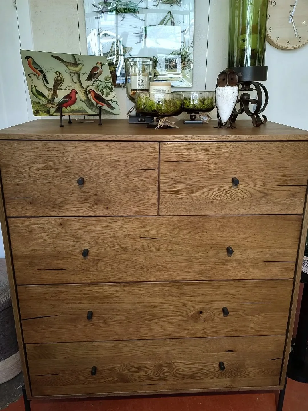 Honey colored wooden chest of drawers with metal pulls and legs. The perfect accent in any room.  #sustainableliving #wooddesign @johnderiancompany #decoupage @janbarboglio