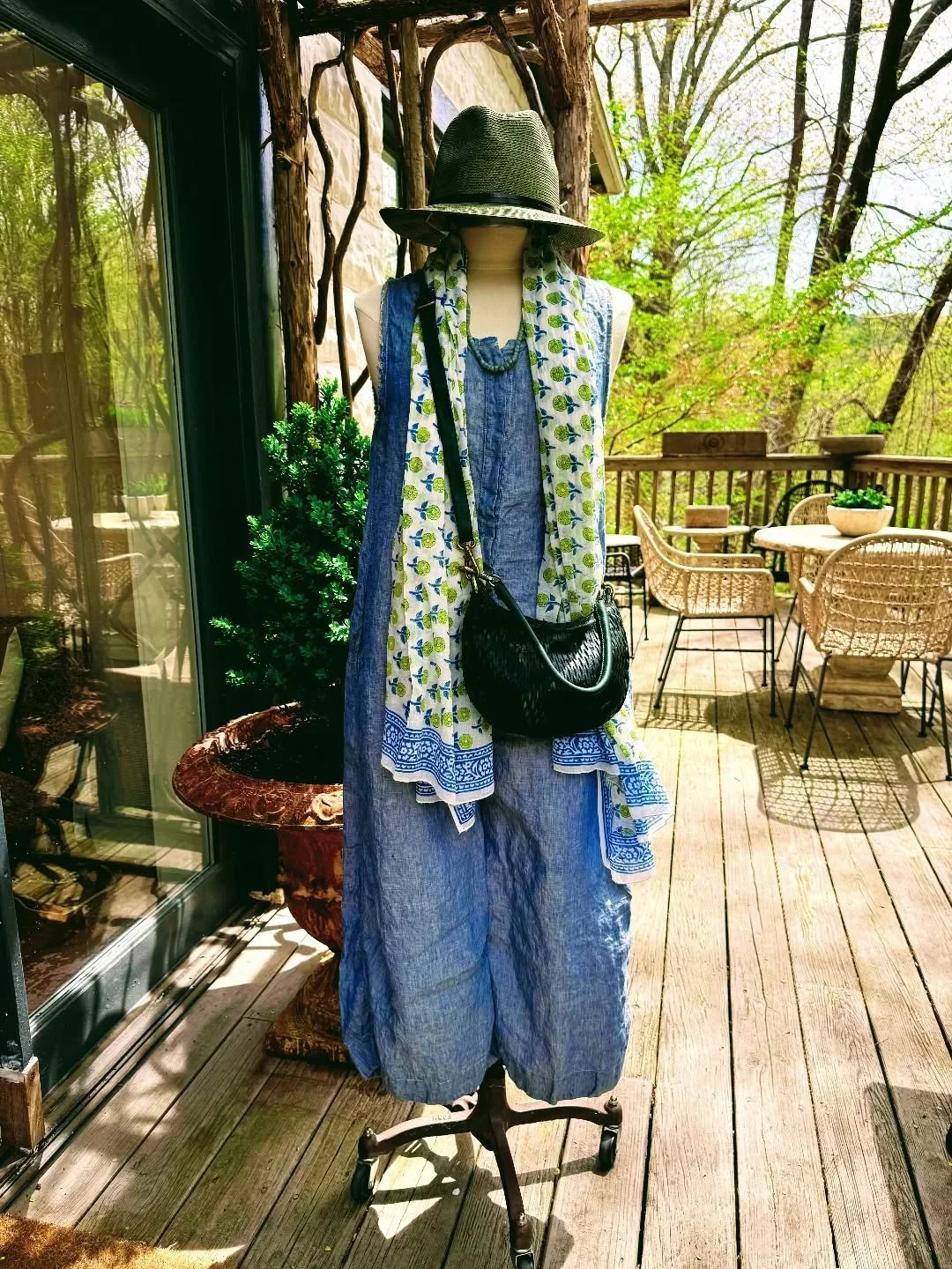 Our @homefrocks manaquin requested an outing on our waterfall viewing deck. Super cool onsie for summer fun, in beautiful, blue linen.  This artisanal spring collection is stellar.  Best selling block print scarf from Paris.  @campomaggi_bags crossbo