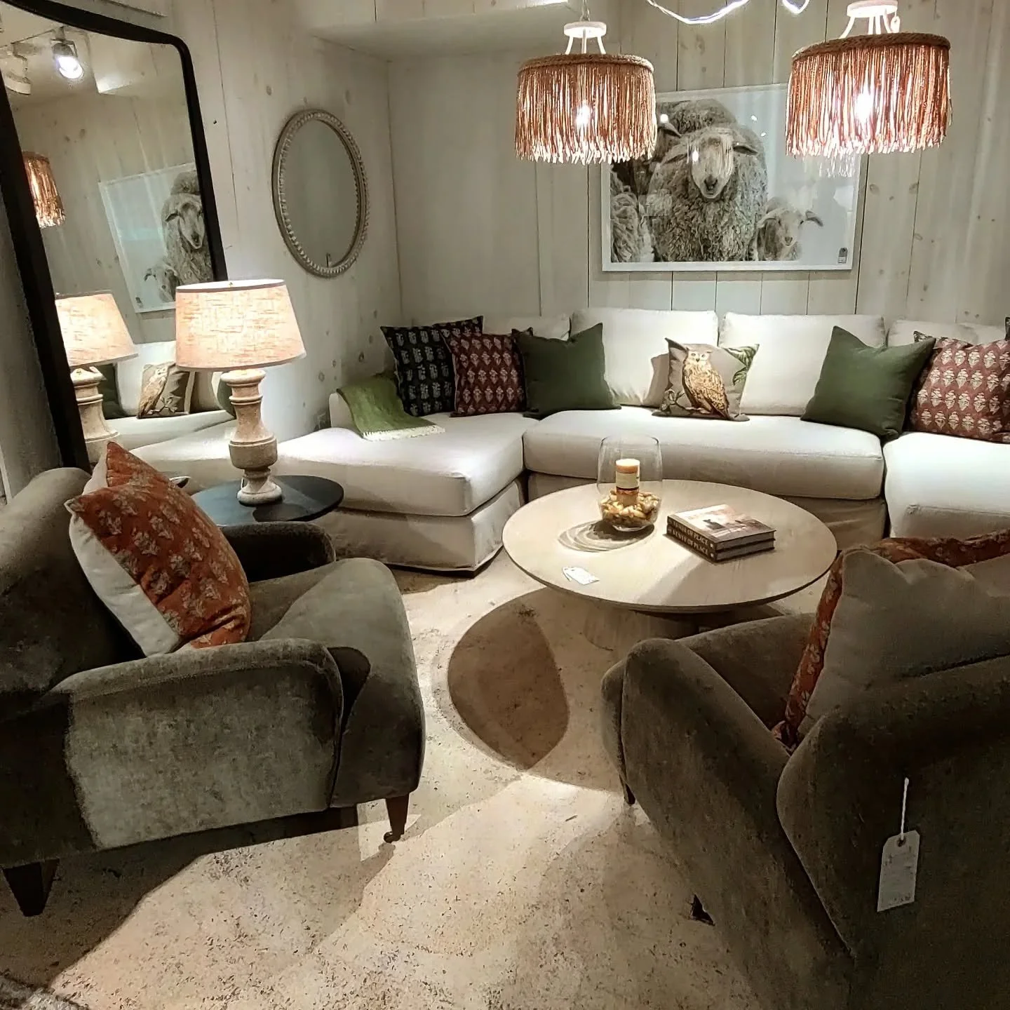 Pair of elegant forest green Velvet Chairs, @leeindustries large scale Double Chaise Sectional in Belgian linenl, Standing Metal Floor Mirror, Mango Coffee Table.  #newshowroom #newpillows #rearrangedtheshop #3oyears #memorialdayweekendsale