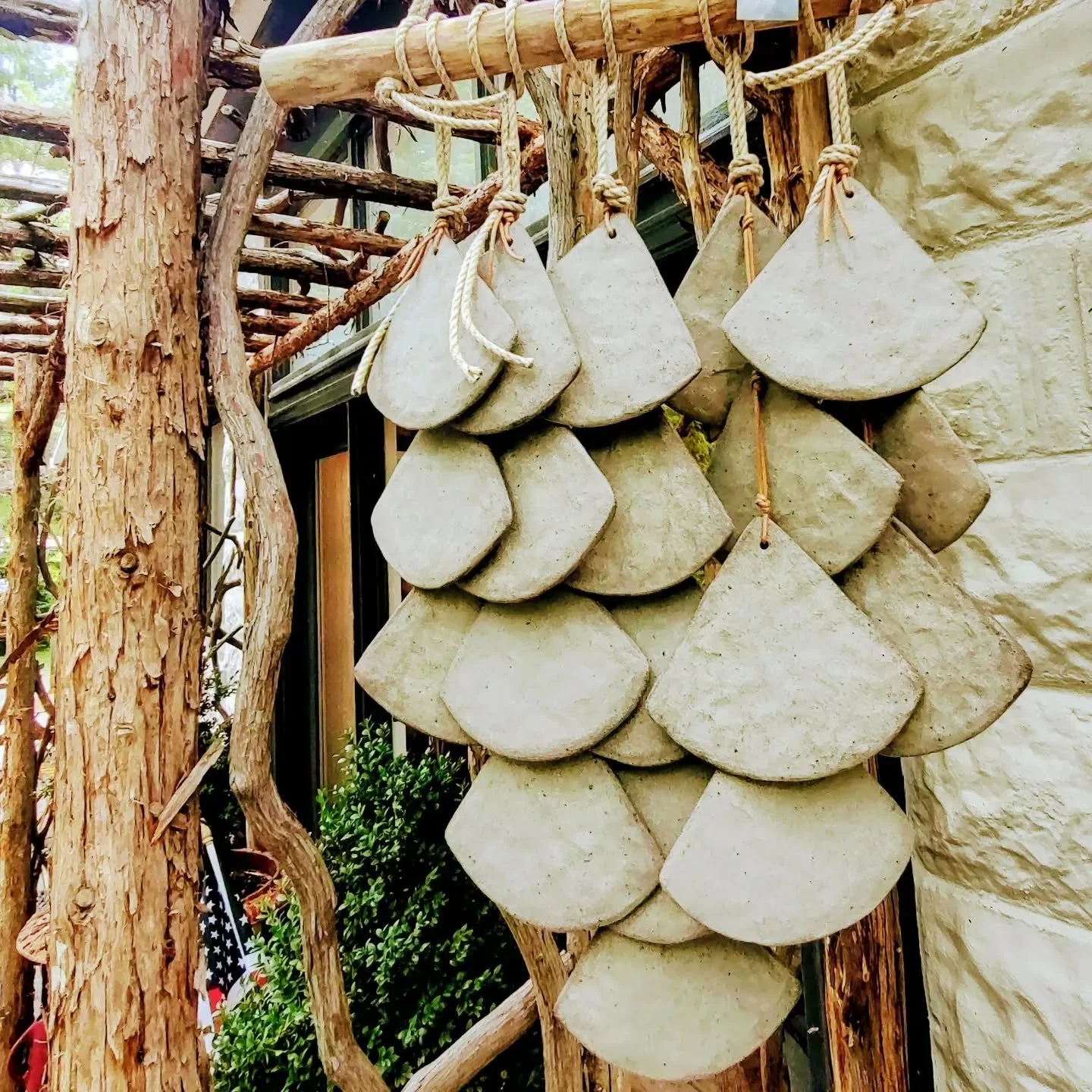 Amazing handmade wind chime by ceramic artist Michelle Quan @mquanstudio.  Other outdoor bells and chimes too. 
#gardenready #greenbeauty #clipped #openeveryday