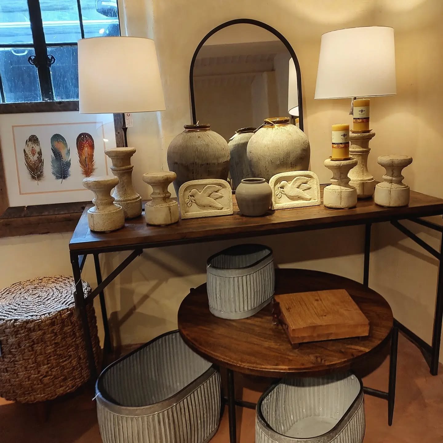 Dolly planters selling fast, cement outdoor pillar holders, vintage urns, vintage wood table, coffee table, arched mirror, French lamps. #vintagefinds #paris #decoratingthehouse #openeveryday #39years