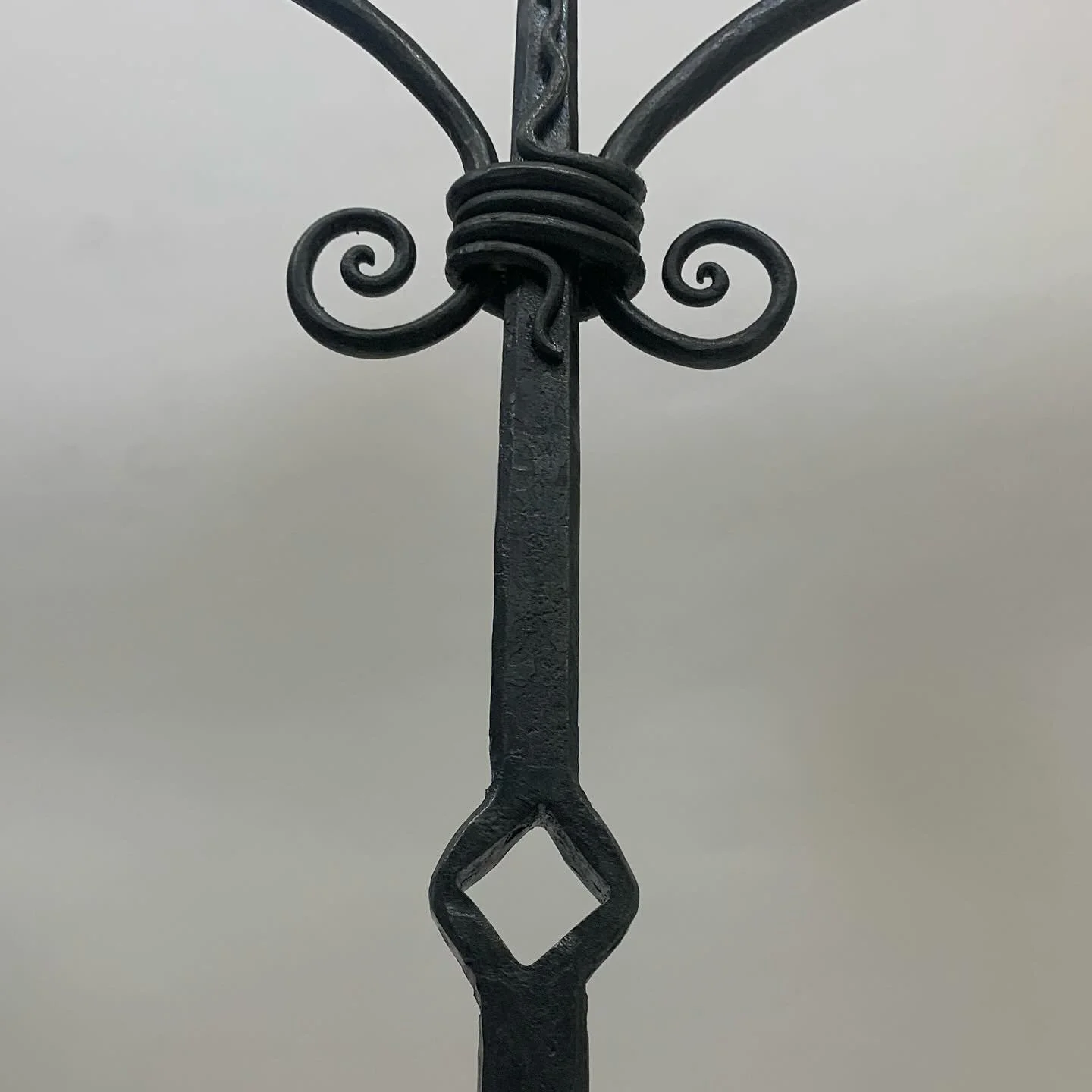 Square drifted hole and scroll with wrapping.
