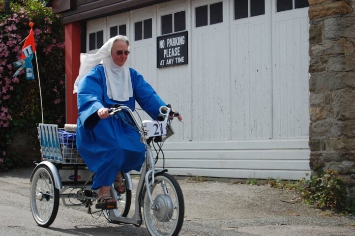 Tour de presteigne Electric Bikes Nun on a bike.jpeg