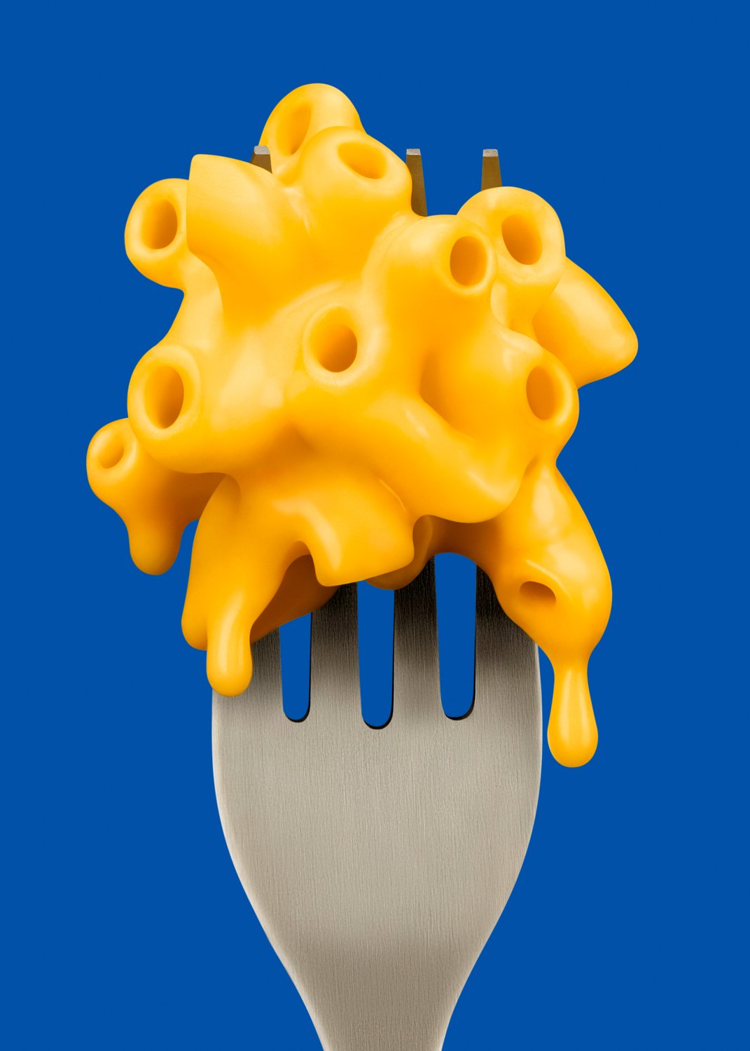 Macaroni and cheese balanced on a fork