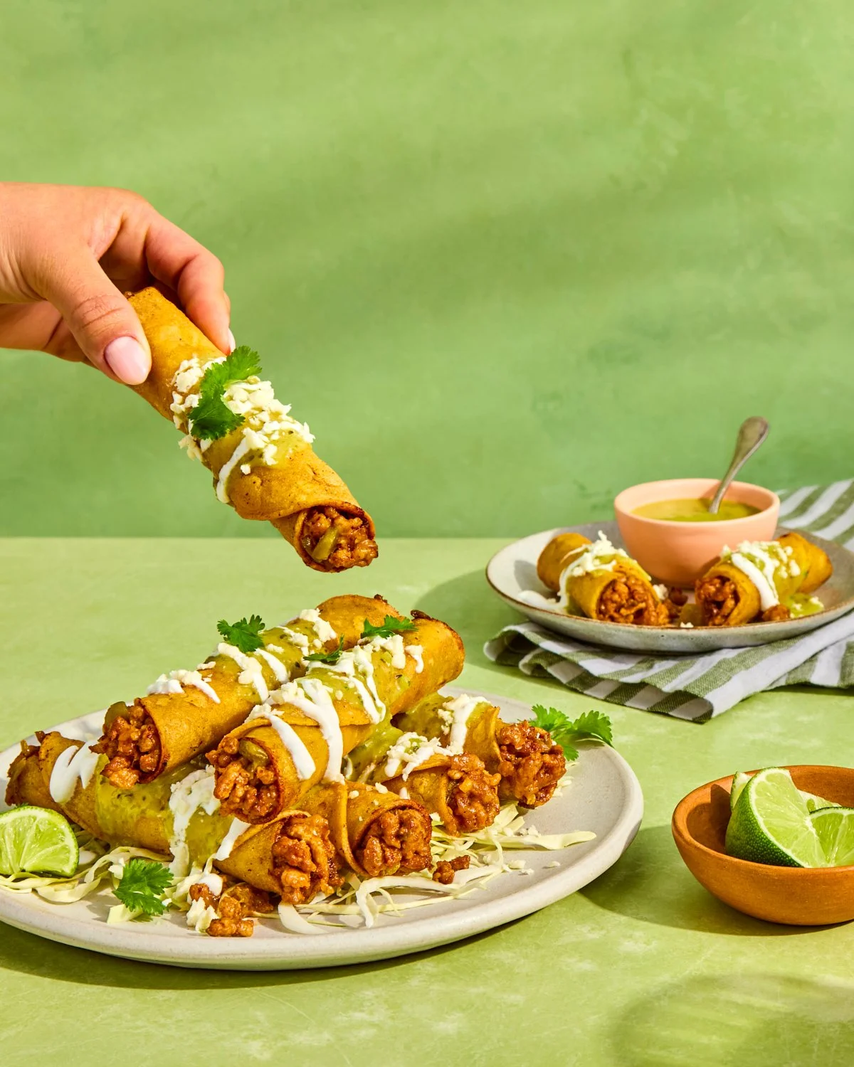 Ground pork taquitos with dipping sauce and bright green styling for National Pork Board.
