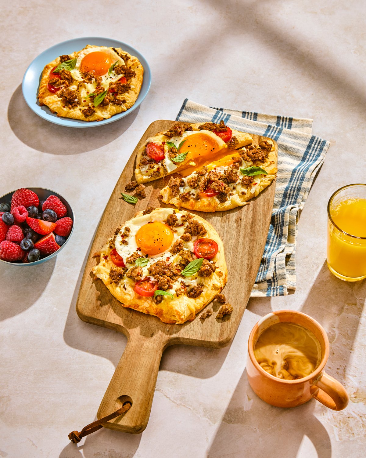 Breakfast sausage pizza with eggs and toppings for National Pork Board’s evergreen recipe library.