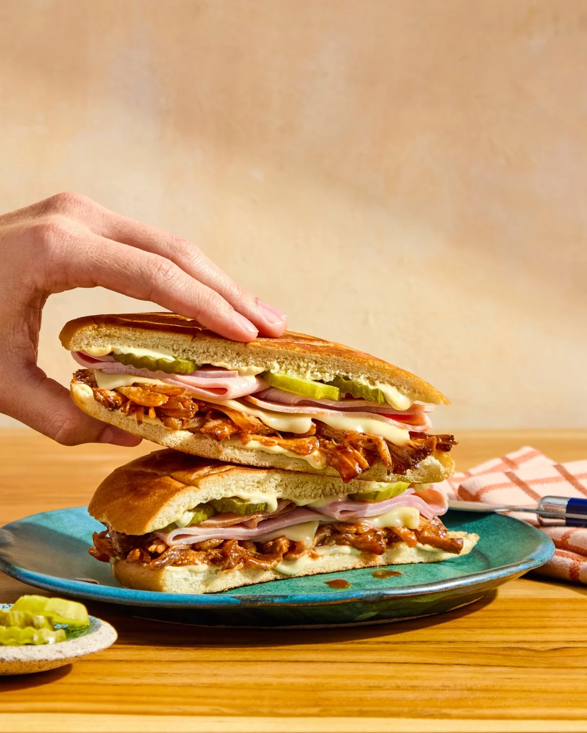 Pulled pork BBQ Cuban sandwich with pickles and cheese for National Pork Board recipe photography.