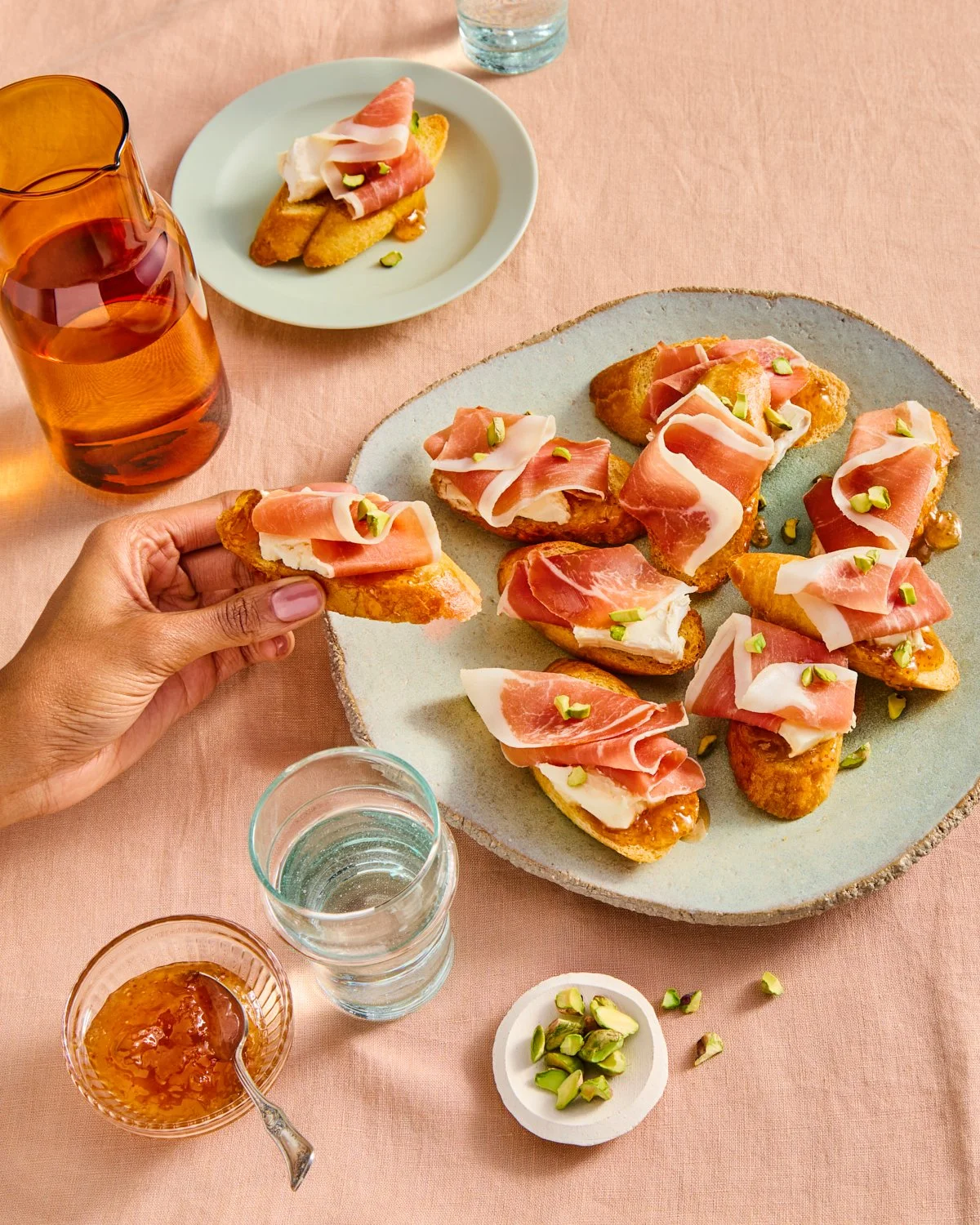 Prosciutto, brie, and fig jam crostini photographed for National Pork Board.