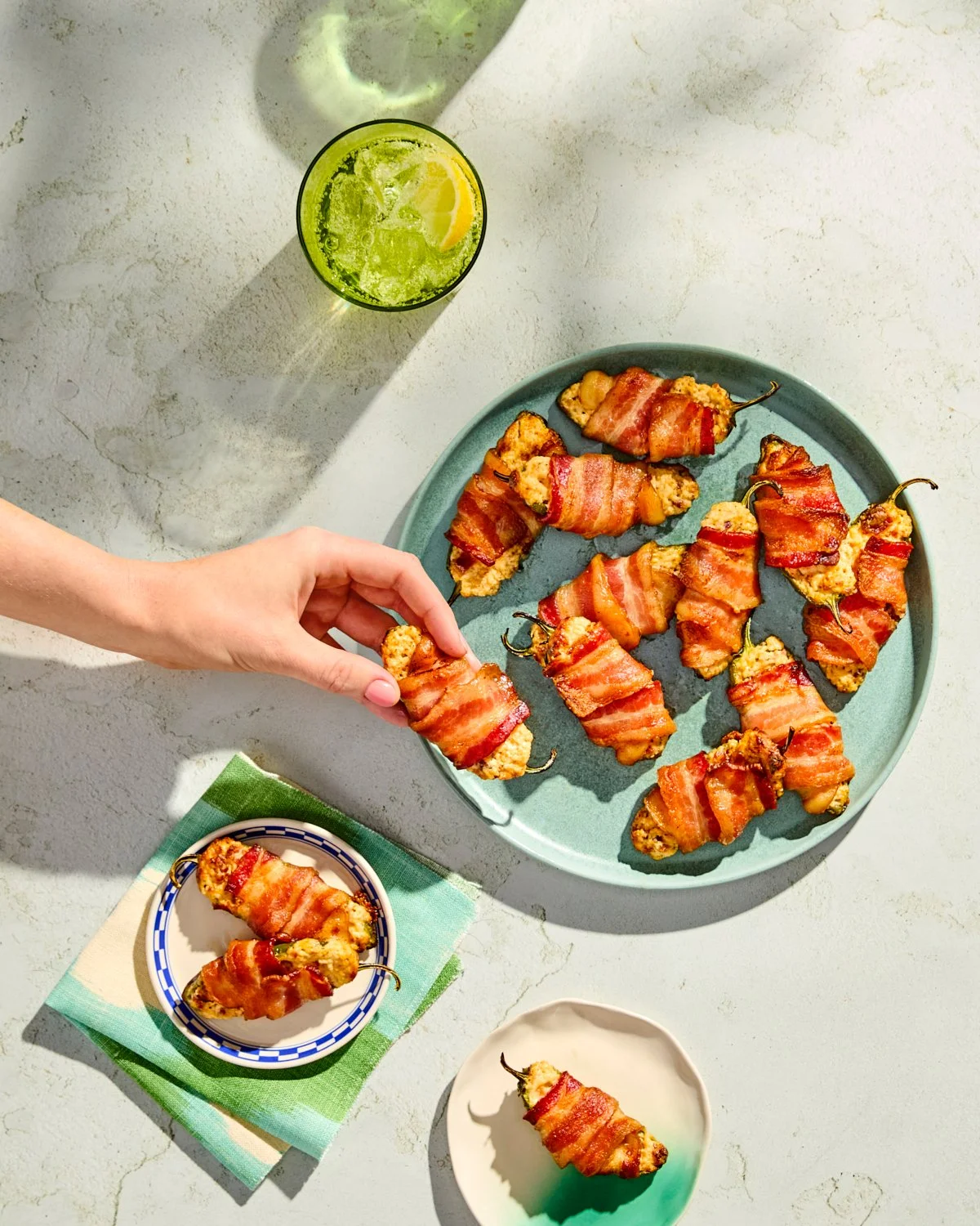 Grilled bacon wrapped jalapeño poppers with dipping sauce for National Pork Board.
