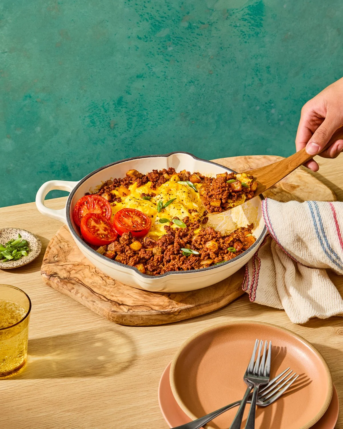 Chorizo hash with eggs and breakfast garnishes for National Pork Board recipe photography.