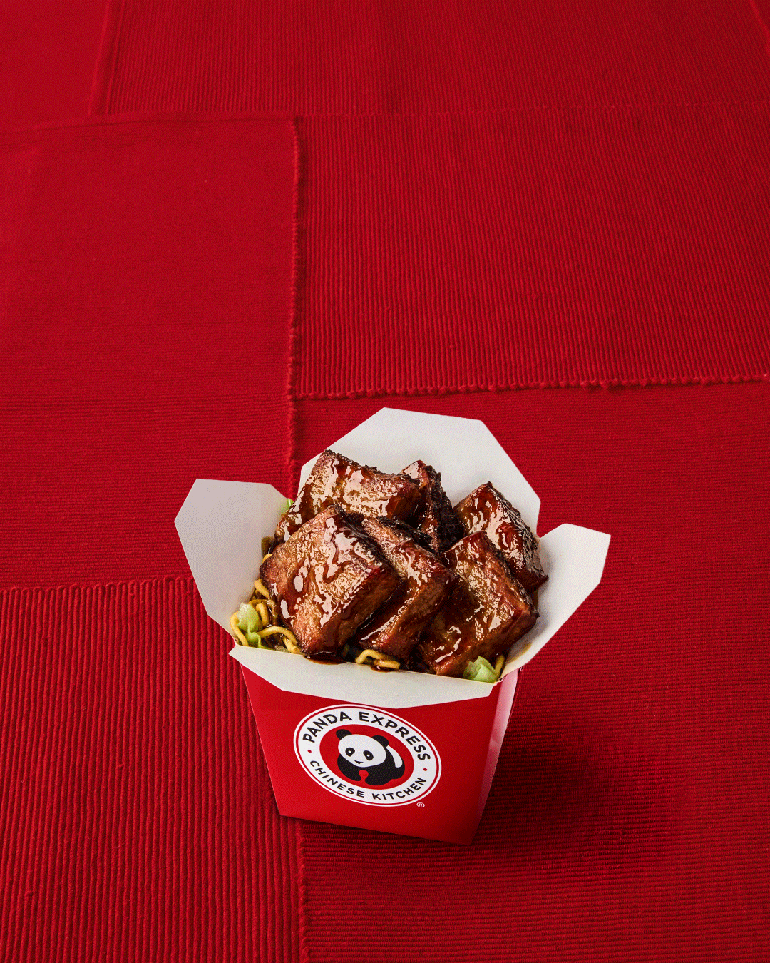 Panda Express Cantonese BBQ Brisket meal with chow mein, broccoli, and Dr Pepper photographed for a national restaurant advertising campaign.