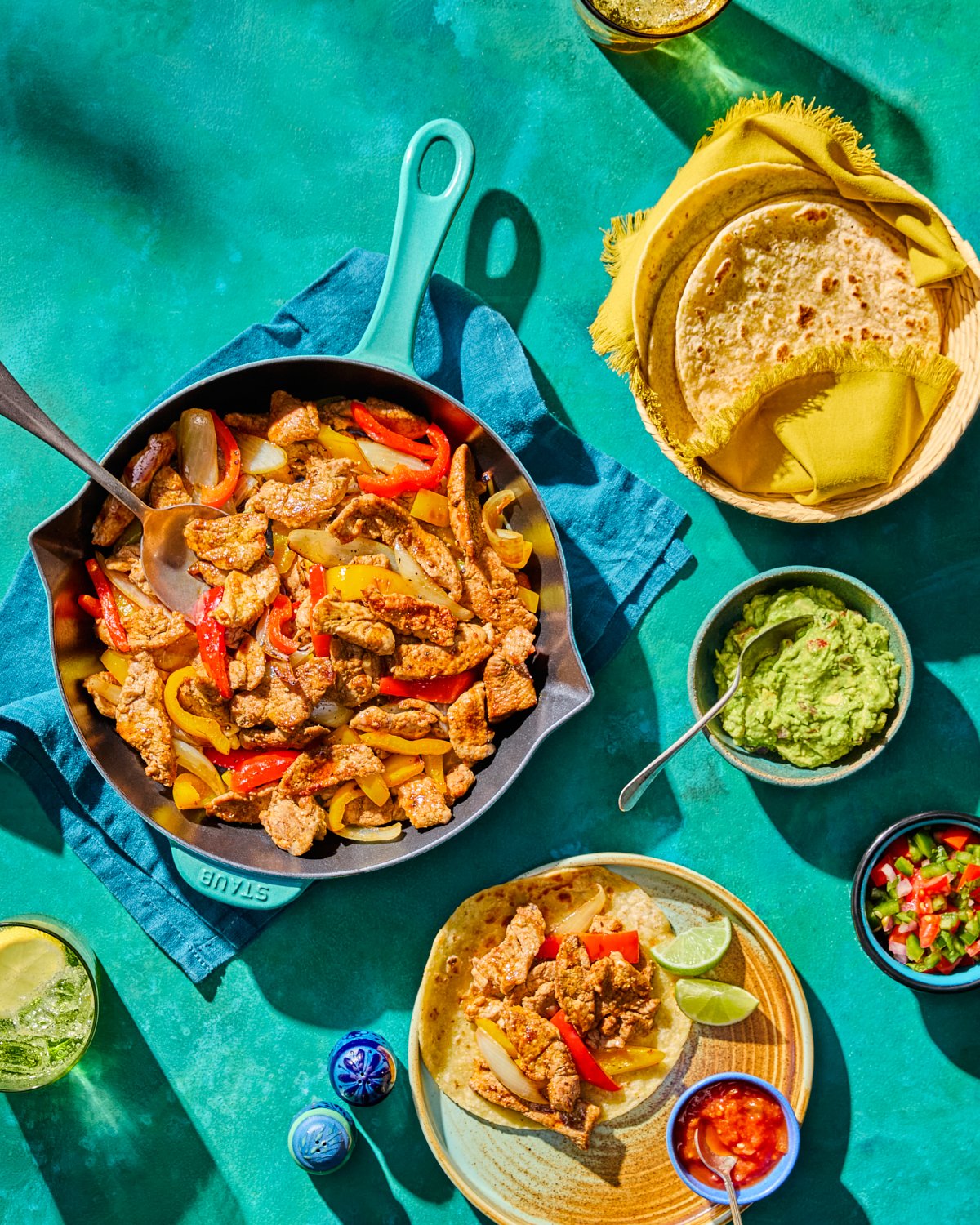 Pork tenderloin fajitas with peppers, tortillas, and guacamole for National Pork Board.