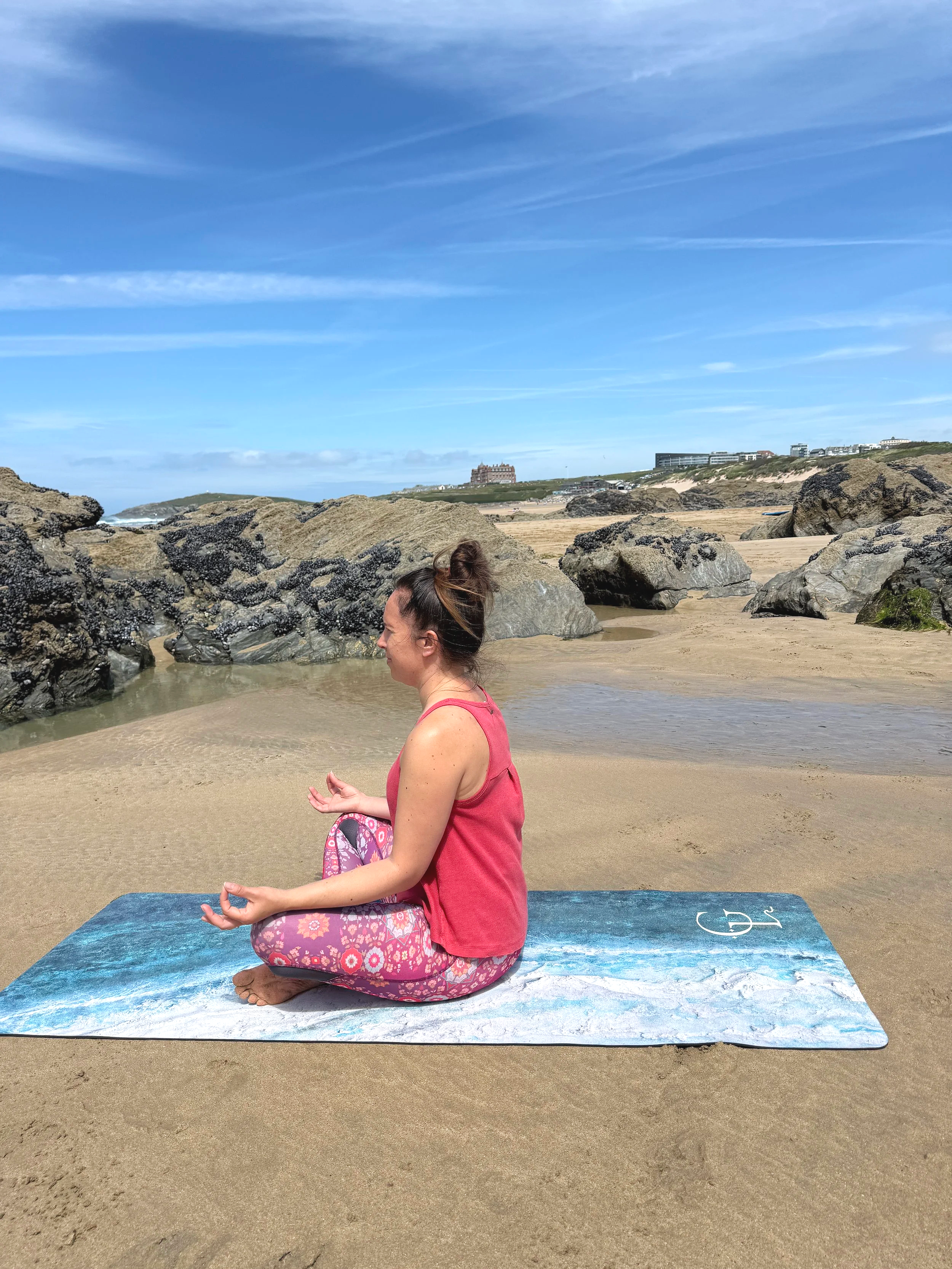 Swell off Shore at Fistral yoga mat lifestyle shot on the beach in Cornwall