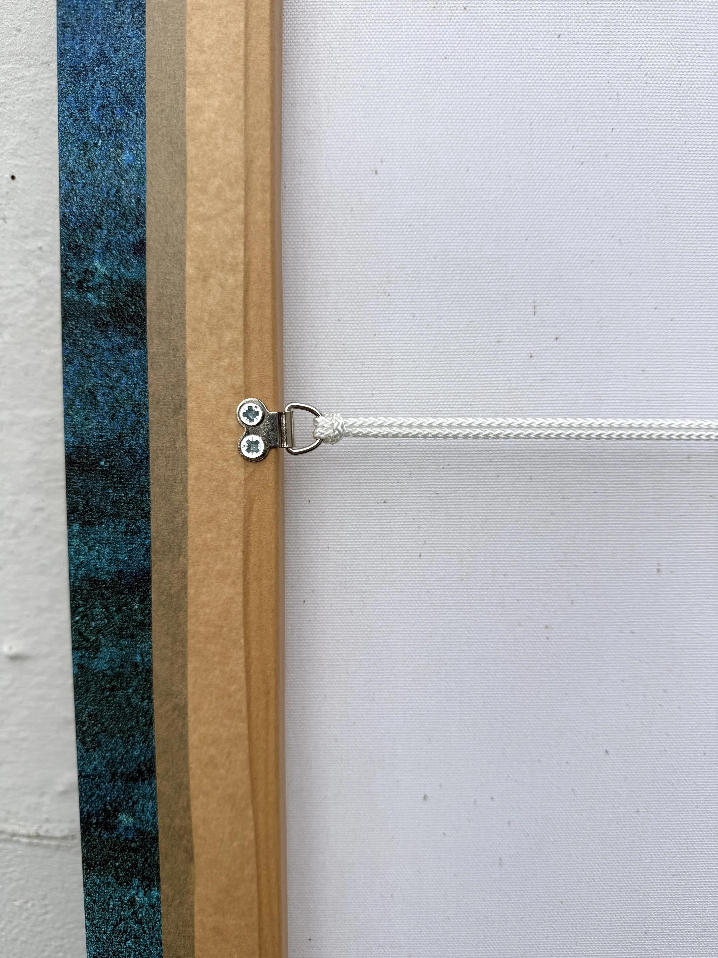 Back of the Underwater Dreaming canvas showing the hand-stretched frame and hanging cord