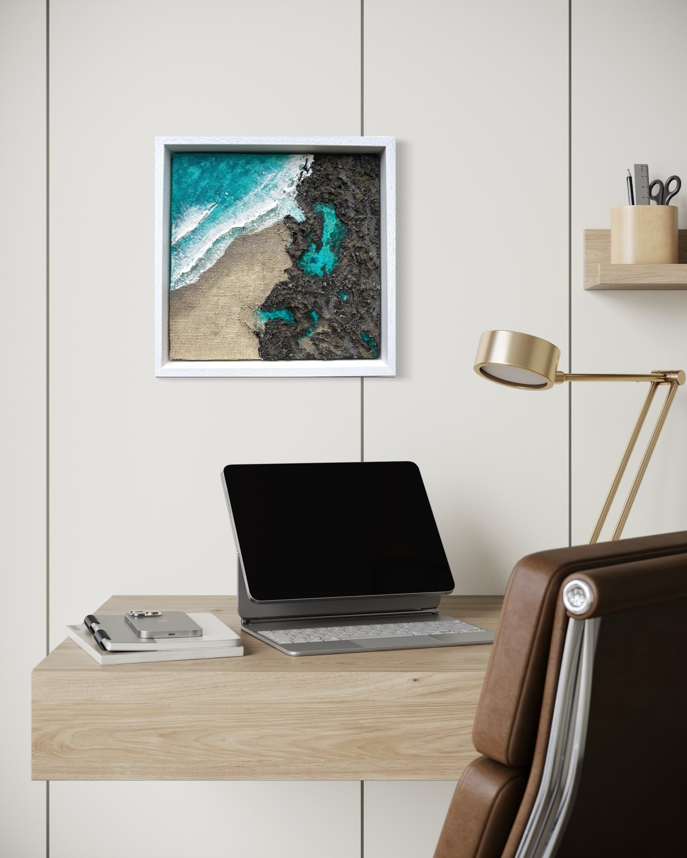 Held by the Rocks shown in an office setting above a desk with laptop
