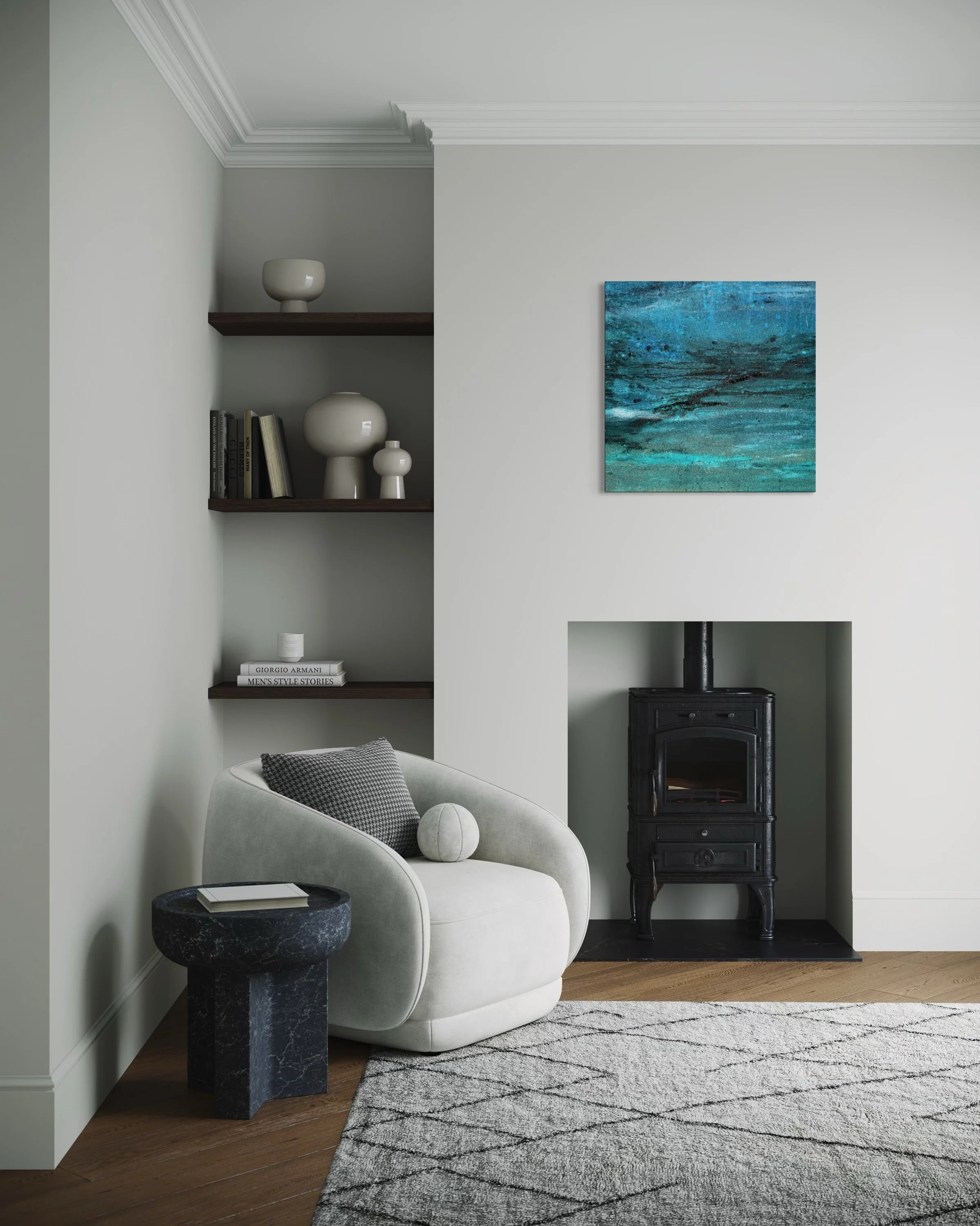 Underwater Dreaming canvas art above a fireplace between next to a grey velvet armchair
