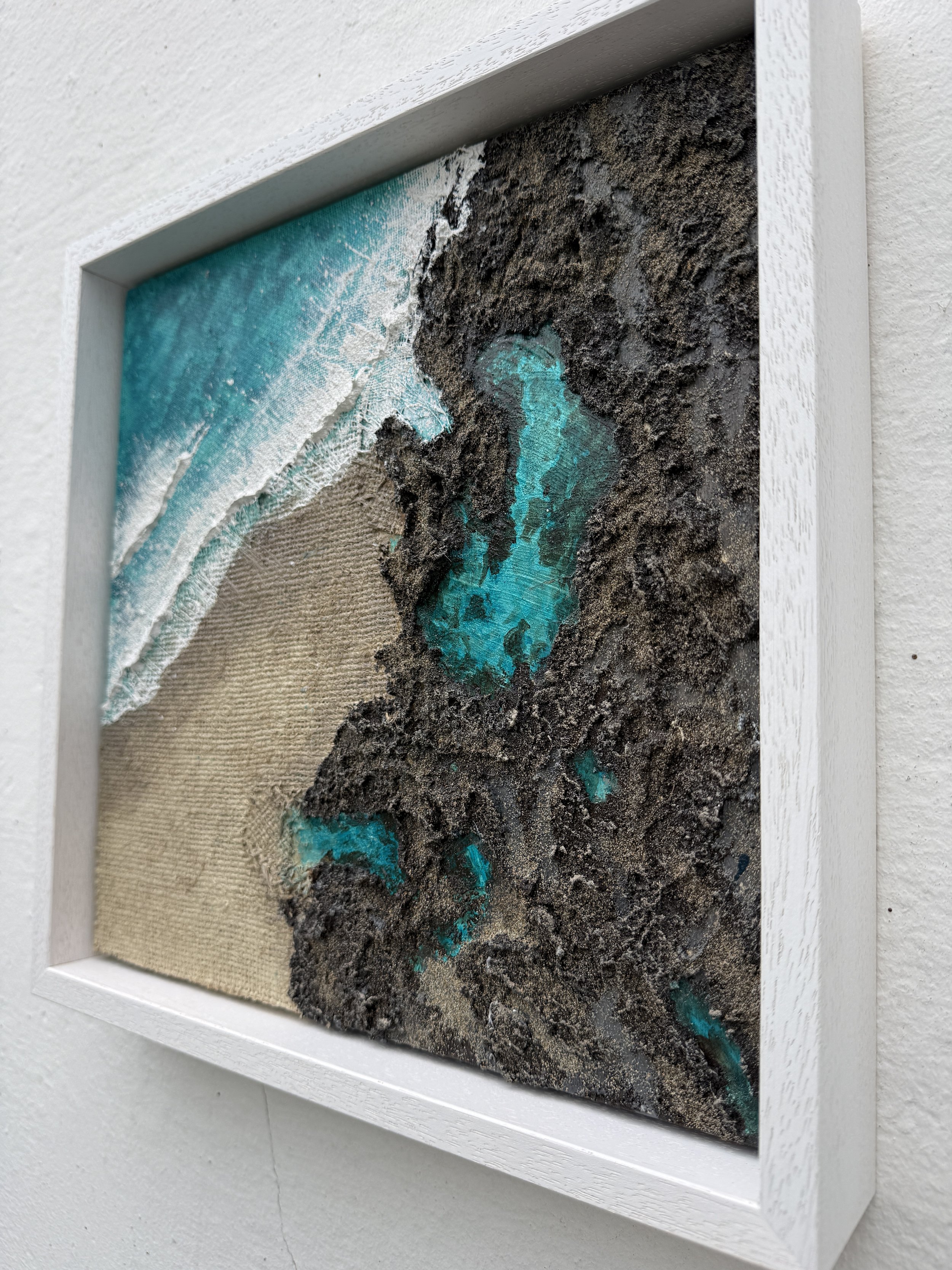 Side view of Held by The Rocks showing 3D texture