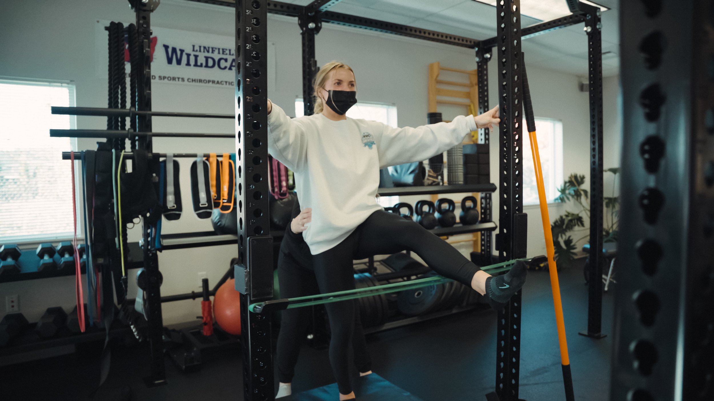 Kenzie practicing exercises from the Internal Strength Model during her mobility session at Northwest Spine and Sport..jpg