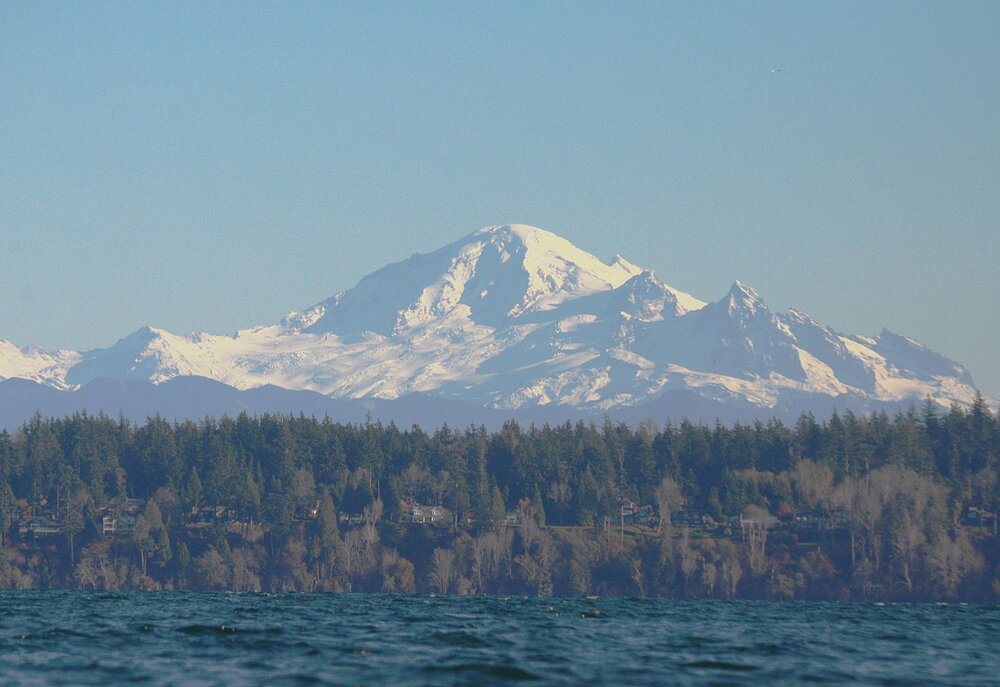 Mount Baker from Boundary Bay. Volcanoes and sea kayaks are a happy combination.