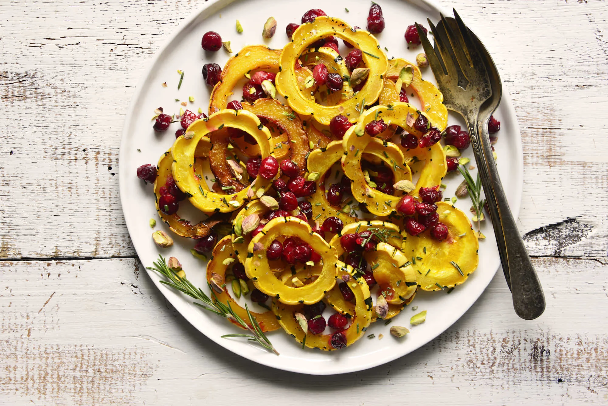 Roasted Delicata Squash with Cranberries and Pistachio
