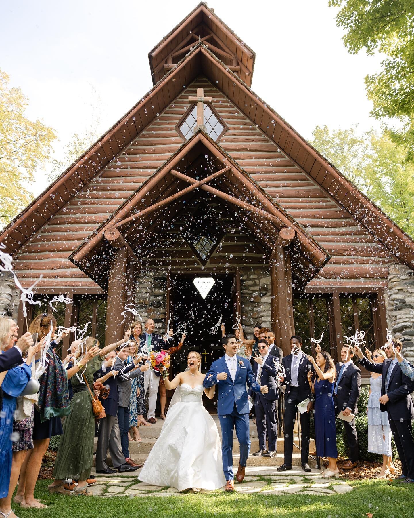 Nothing like the best grand exit ever! Bubbles, wands and a second line leading into the reception.