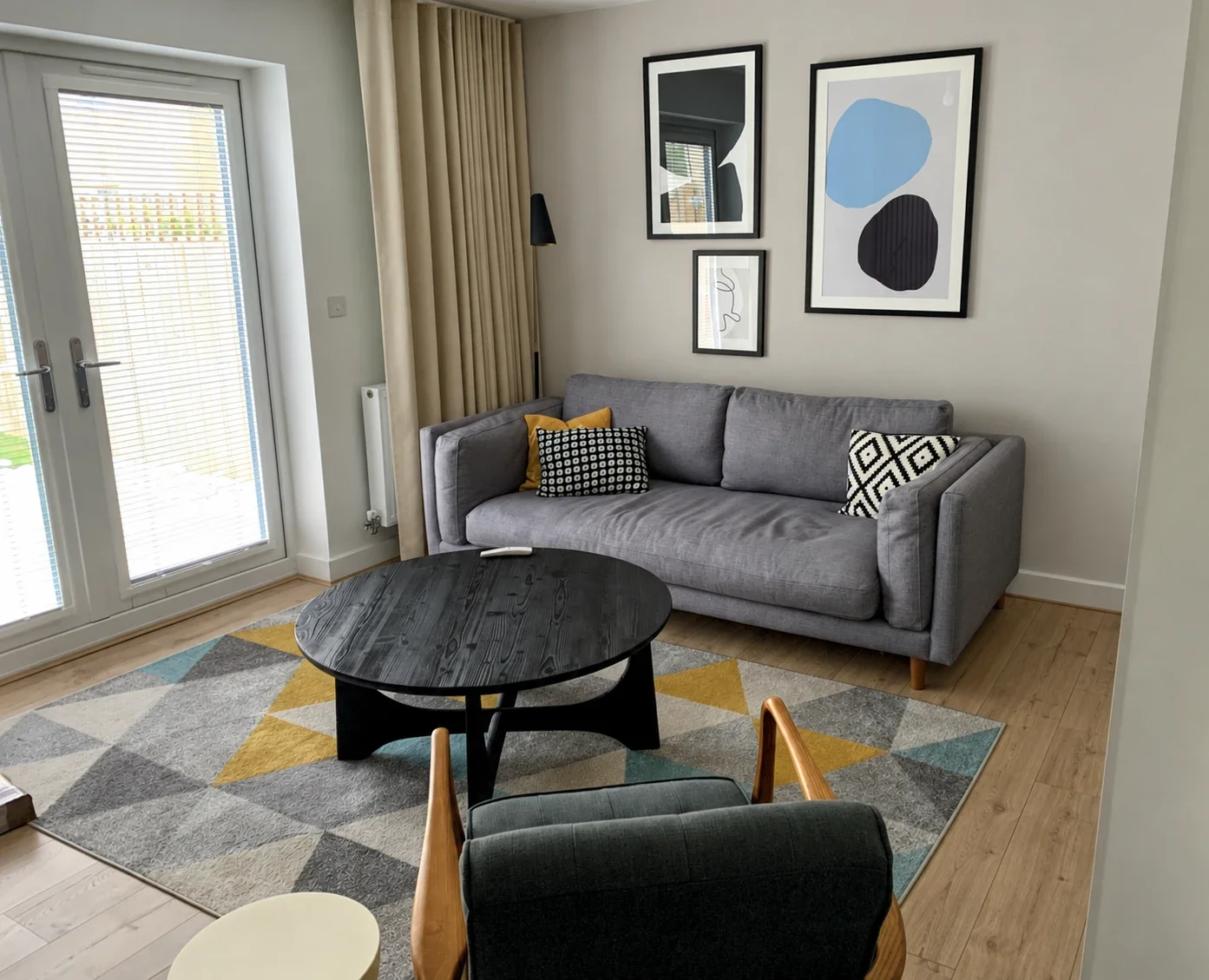 Neutral contemporary living room after online interior design