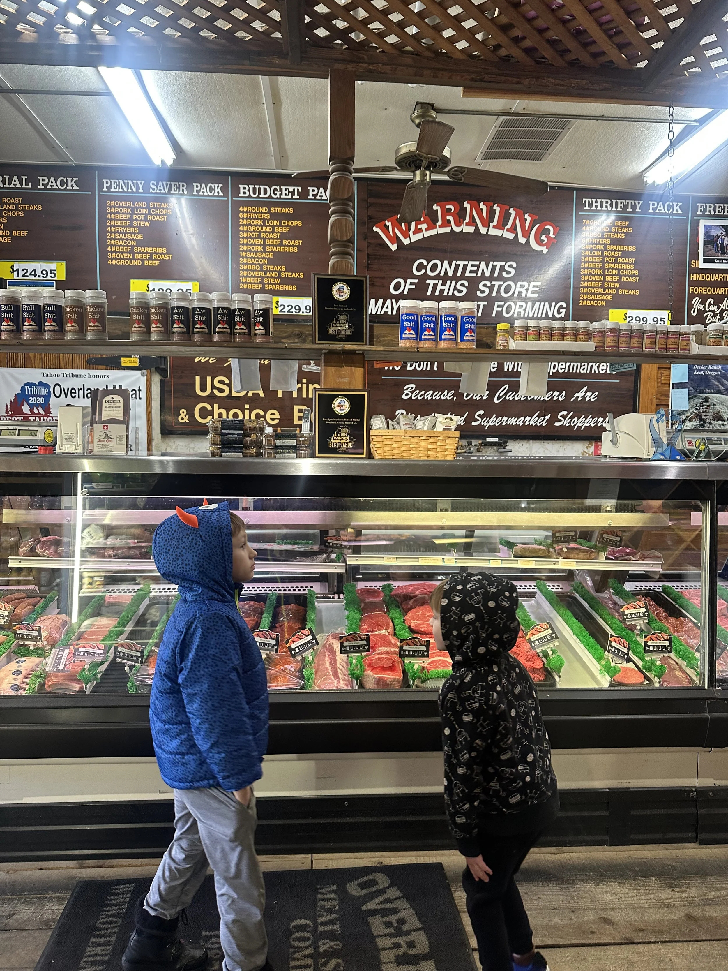 Overland Meats.  Great top quality meat and fish flown in from Hawaii, including Poke.  Pricey but they have a "locals deal" special every day.  Check the printout when you get there to check that day's deal. 