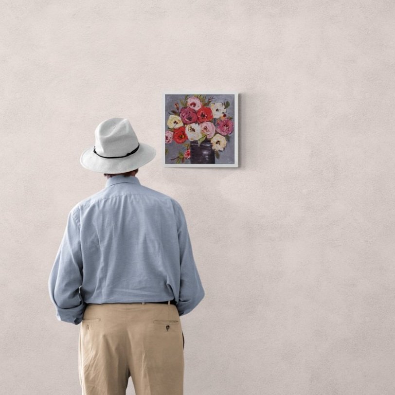 Man_standing_in_front_of_gallery_wall.jpg