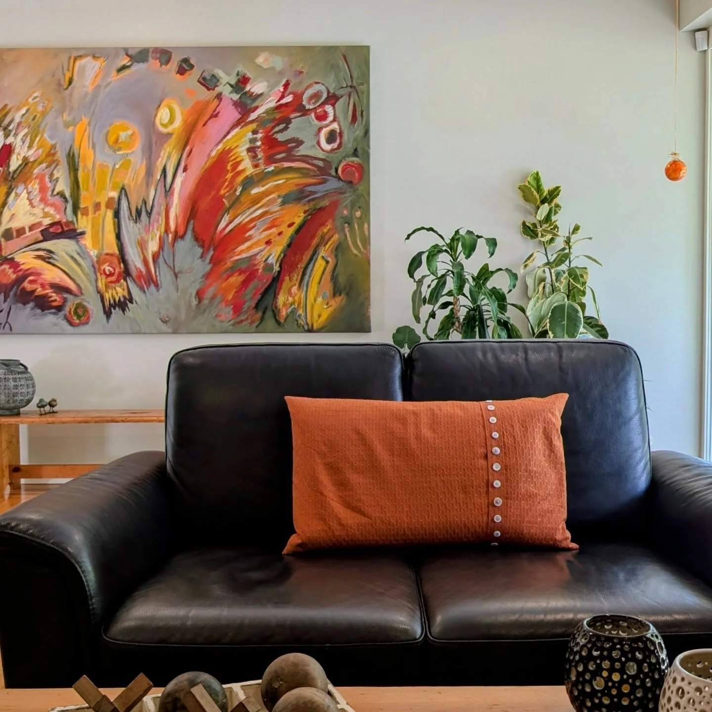This large 8x4ft painting in my living room is so powerful that I had to give it a little friend - A PILLOW. Now while sitting on the couch looking at both, the painting in the background and the pillow in the foreground, I feel both belong. 

#there