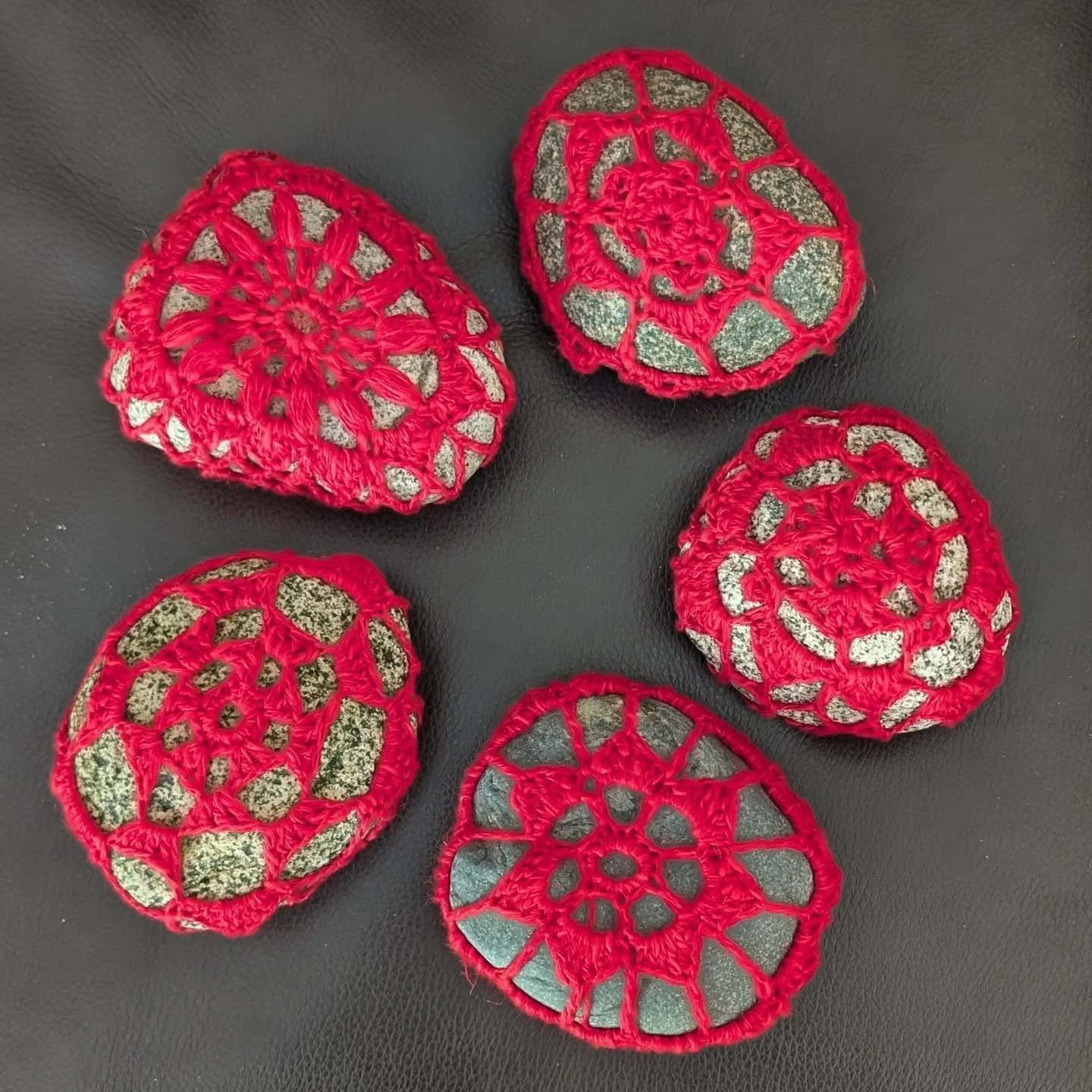 5 red dressed up rocks ready to be picked up - created for a very special lady. I looked after her when she was a preschooler, now she is a mom of 3 beautiful children. 5 rocks - one for each member of the family. 

#thereseljoseph #art #artist #hand