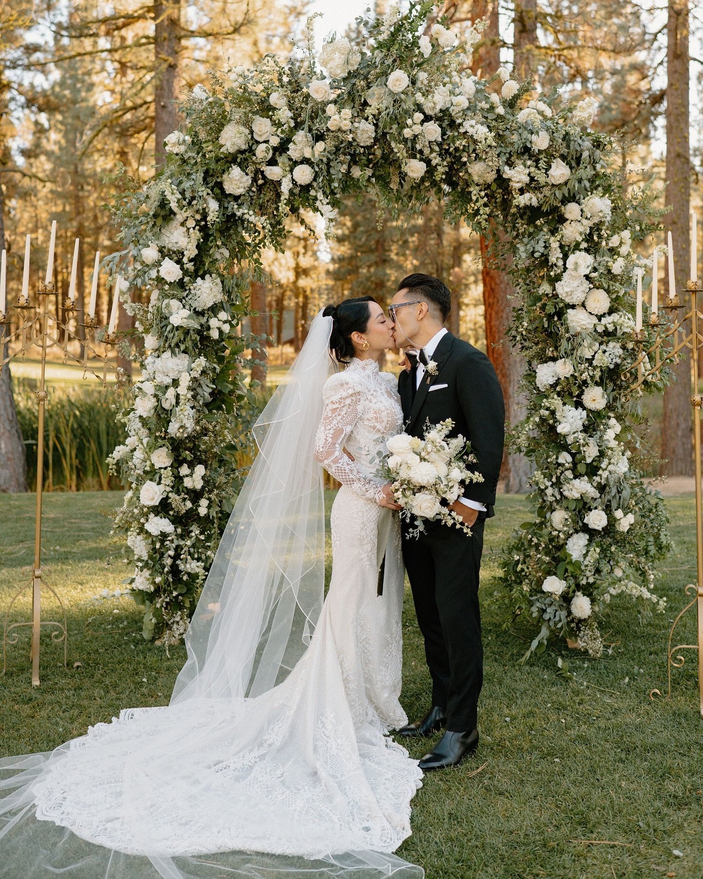 A white wedding amongst the pines. ✨🤍🌲 Such a beautiful day for S + C. 

Photographer: @peytonrbyford 
Florist: @irisandbarryblooms 
Venue: @chaletviewlodge 

Keywords: Lake Tahoe, Tahoe, wedding, Truckee, florist, Olympic Valley, Graeagle, arch, a