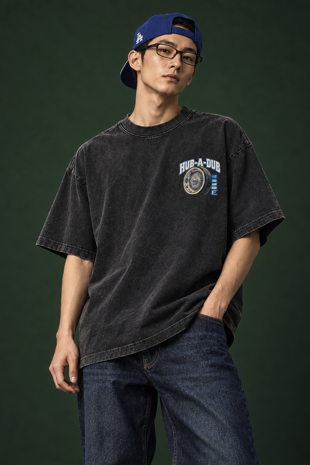 lose-up of the blue Mega Man, lowrider and Hub-A-Dub lettering on the Charged Up tee
