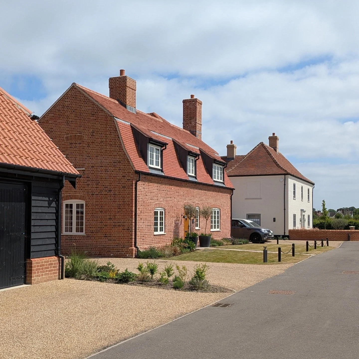 Our heritage-led approach imagined how a rural settlement naturally evolves&mdash;from post-medieval origins to present day. Each dwelling represents a different era of construction, creating an authentic narrative of incremental growth.

#townplanni