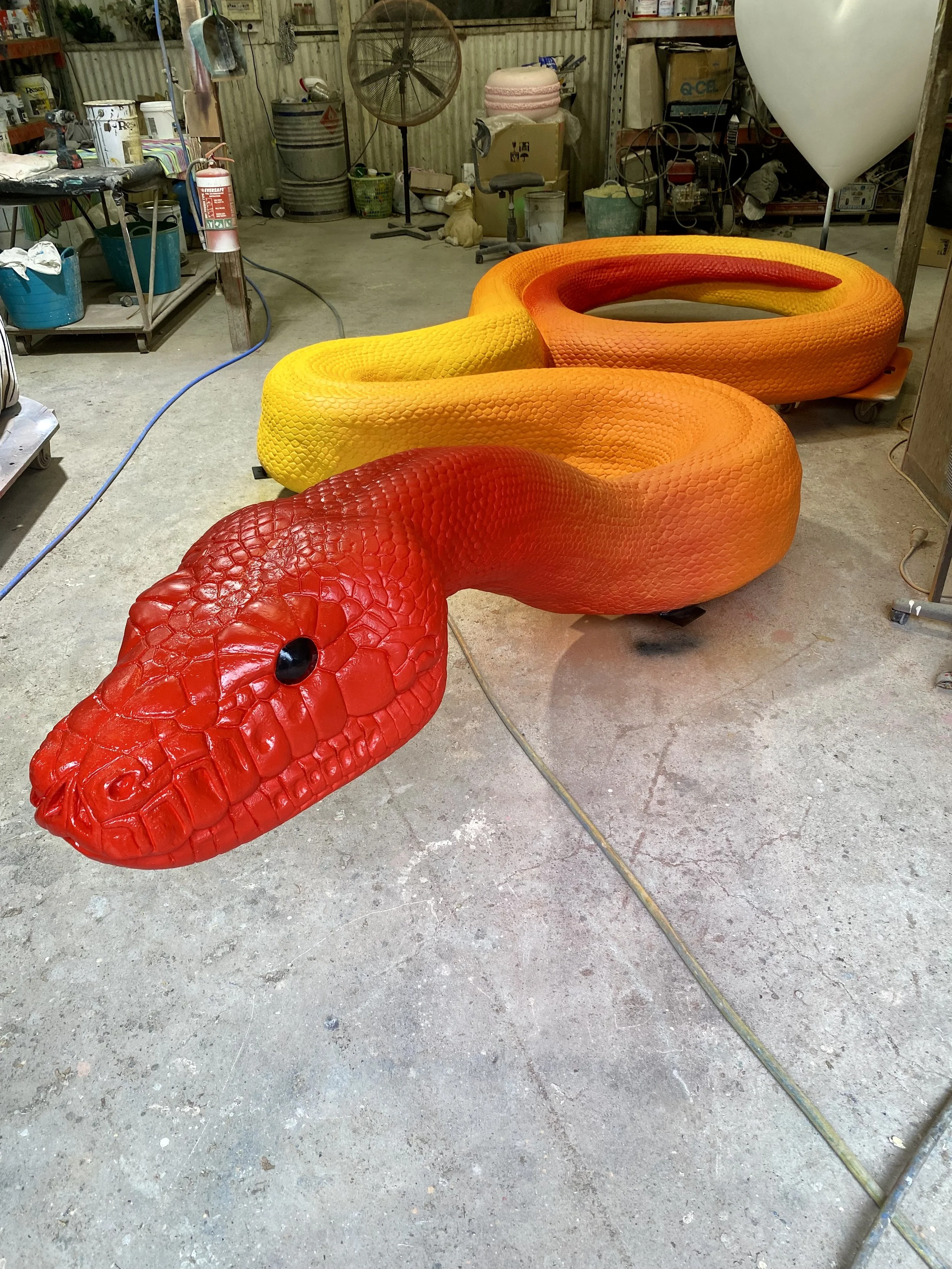 Rainbow Serpent painted by Matt Smidt at Natureworks Australia