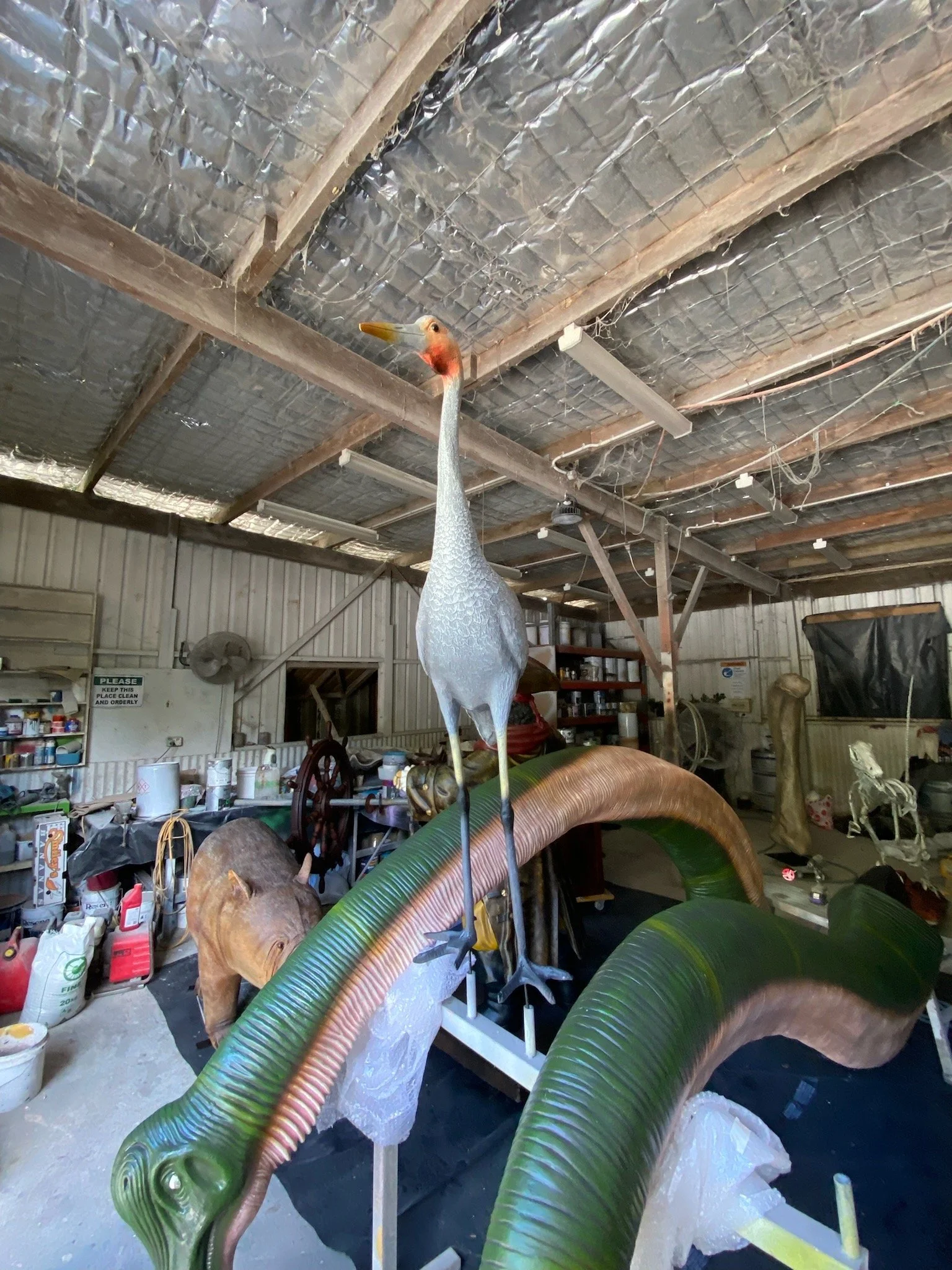Stork and dinosaurs painted by Matt Smidt at Natureworks Australia