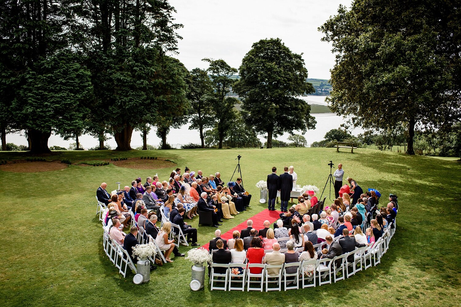 Outdoor wedding ceremony at Mansion House Llansteffan