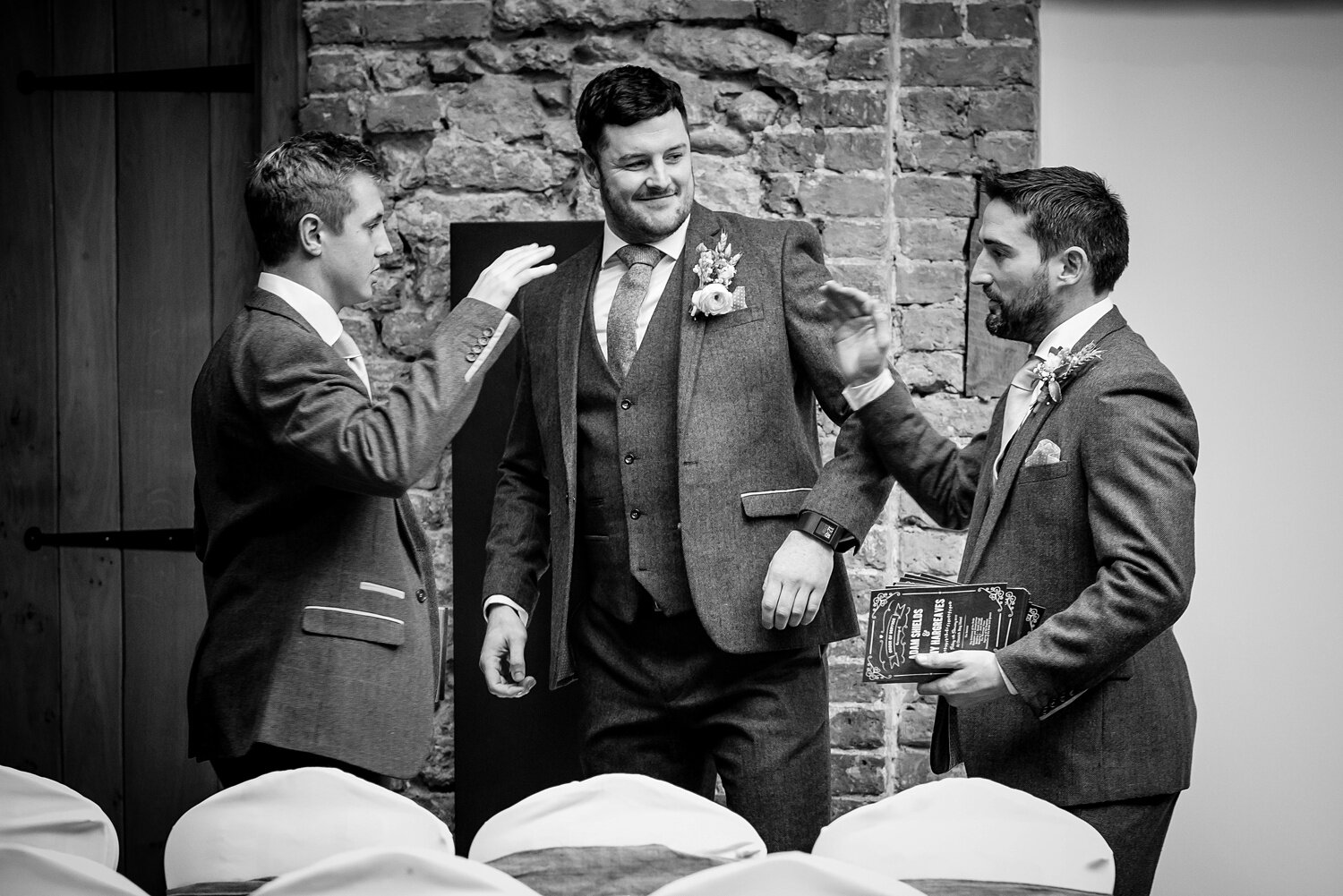 High-fives between groomsmen