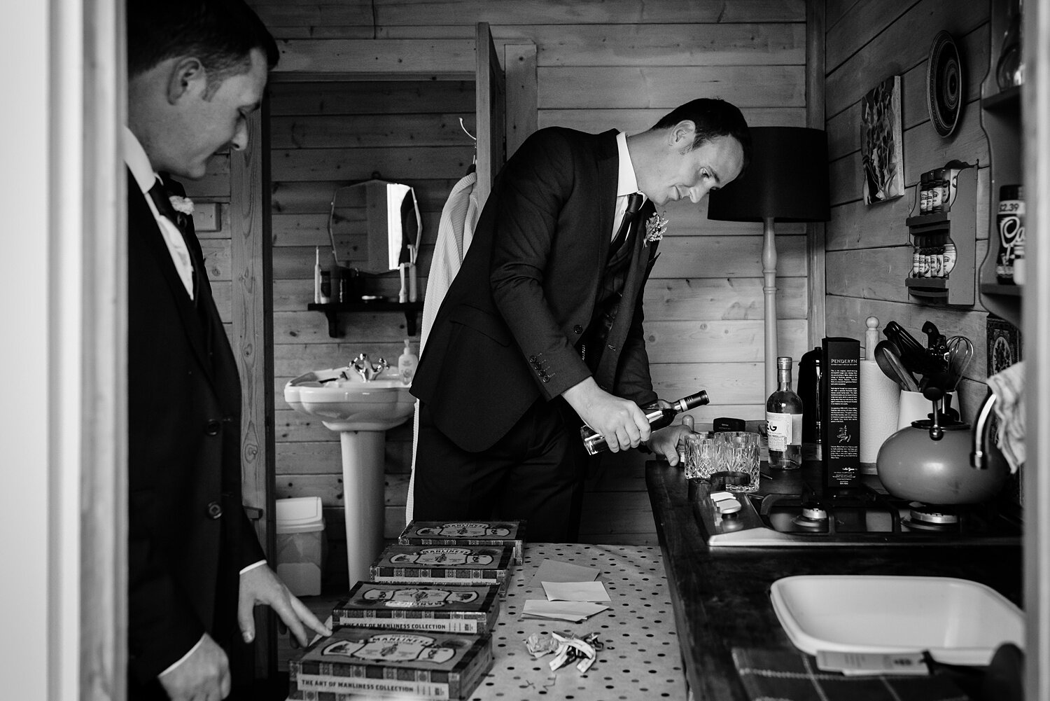 Groom pours whiskey for wedding at Ceridwen Centre