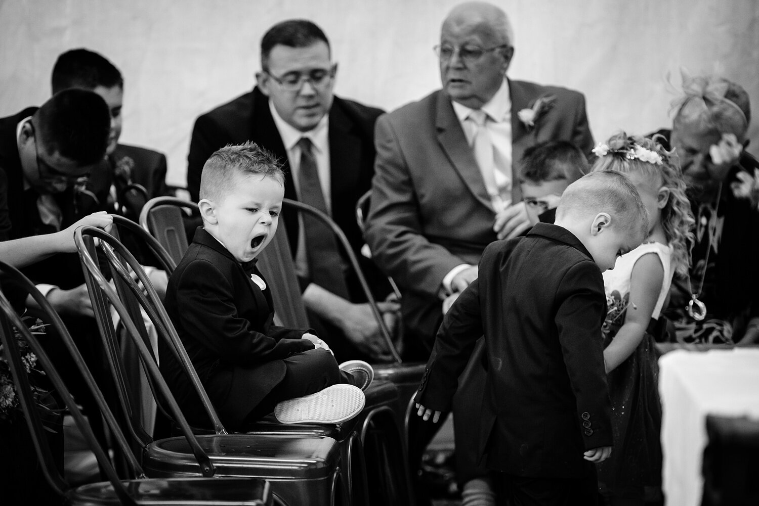  Pageboy bored at the wedding ceremony.  