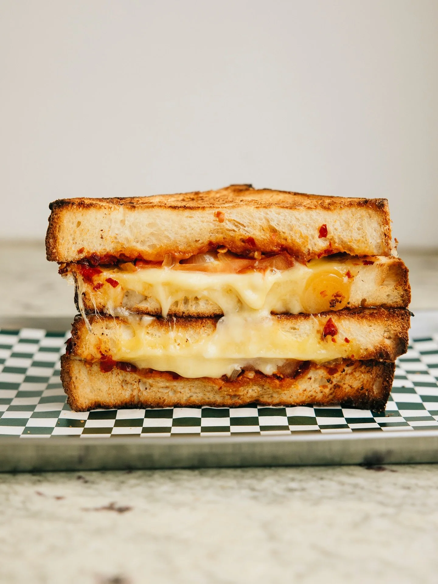 THE SPICY TOASTIE. 

Onion, pickles, chilli, tomato and cheese. Simple but full of flavour.