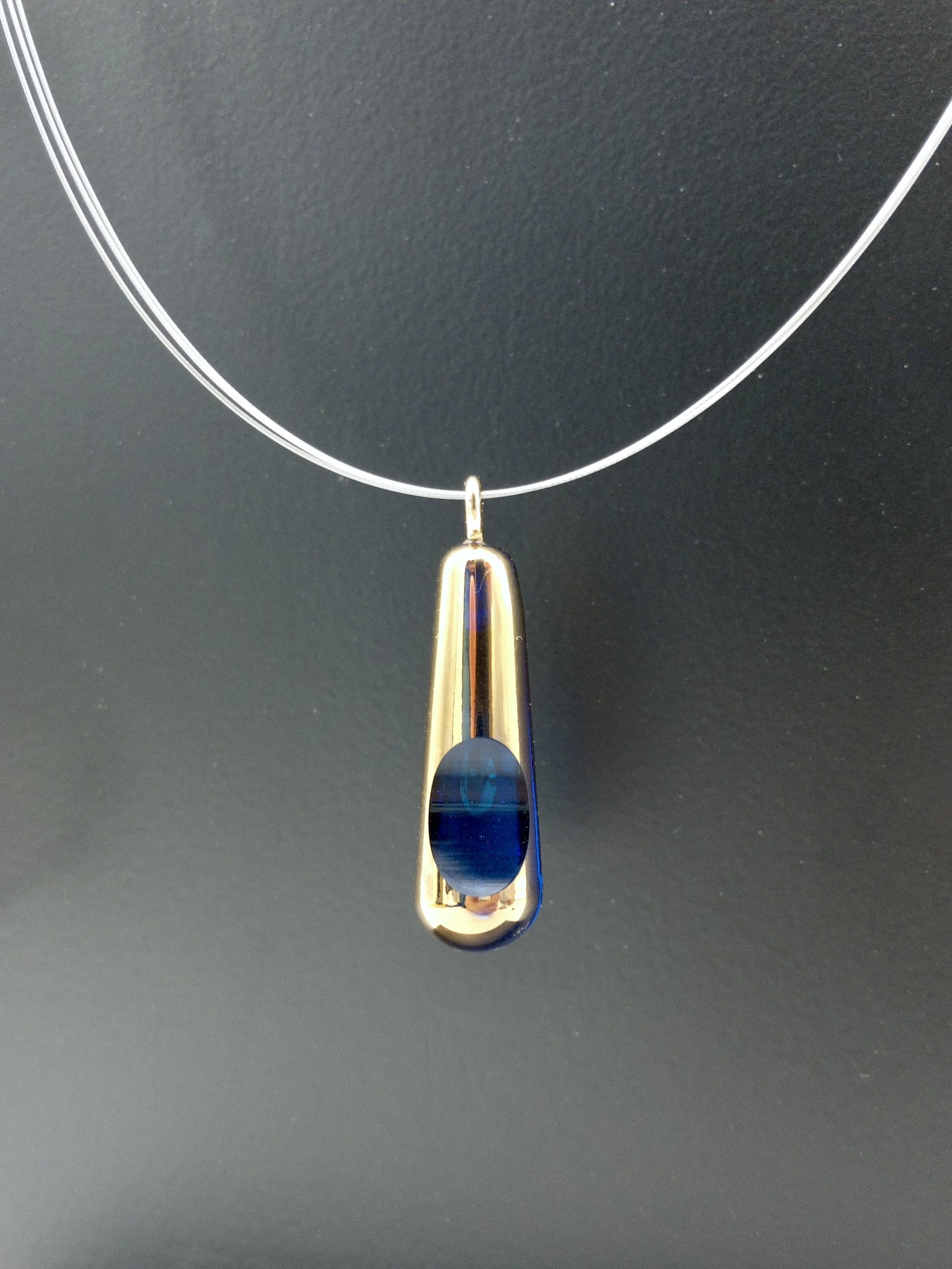 Pendentif vapeurs d'or Bleu